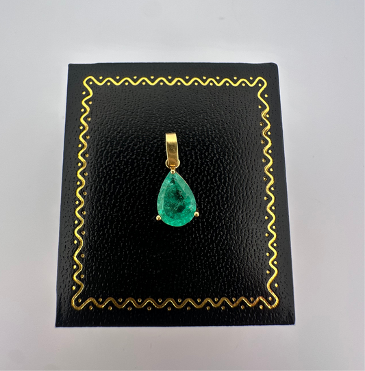 Vintage natural emerald pear shaped pendant set in 14k yellow gold