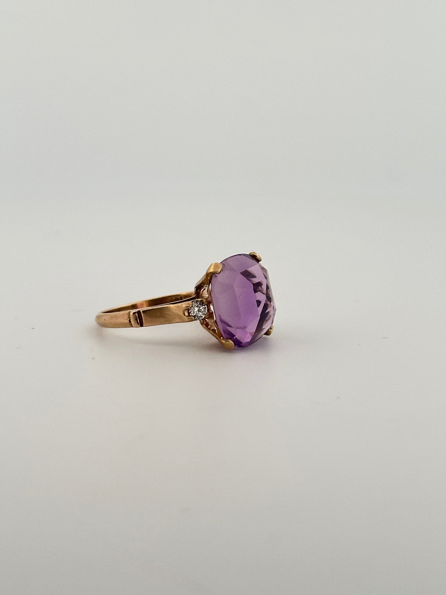 Antique Victorian amethyst ring with diamond accents in 10k