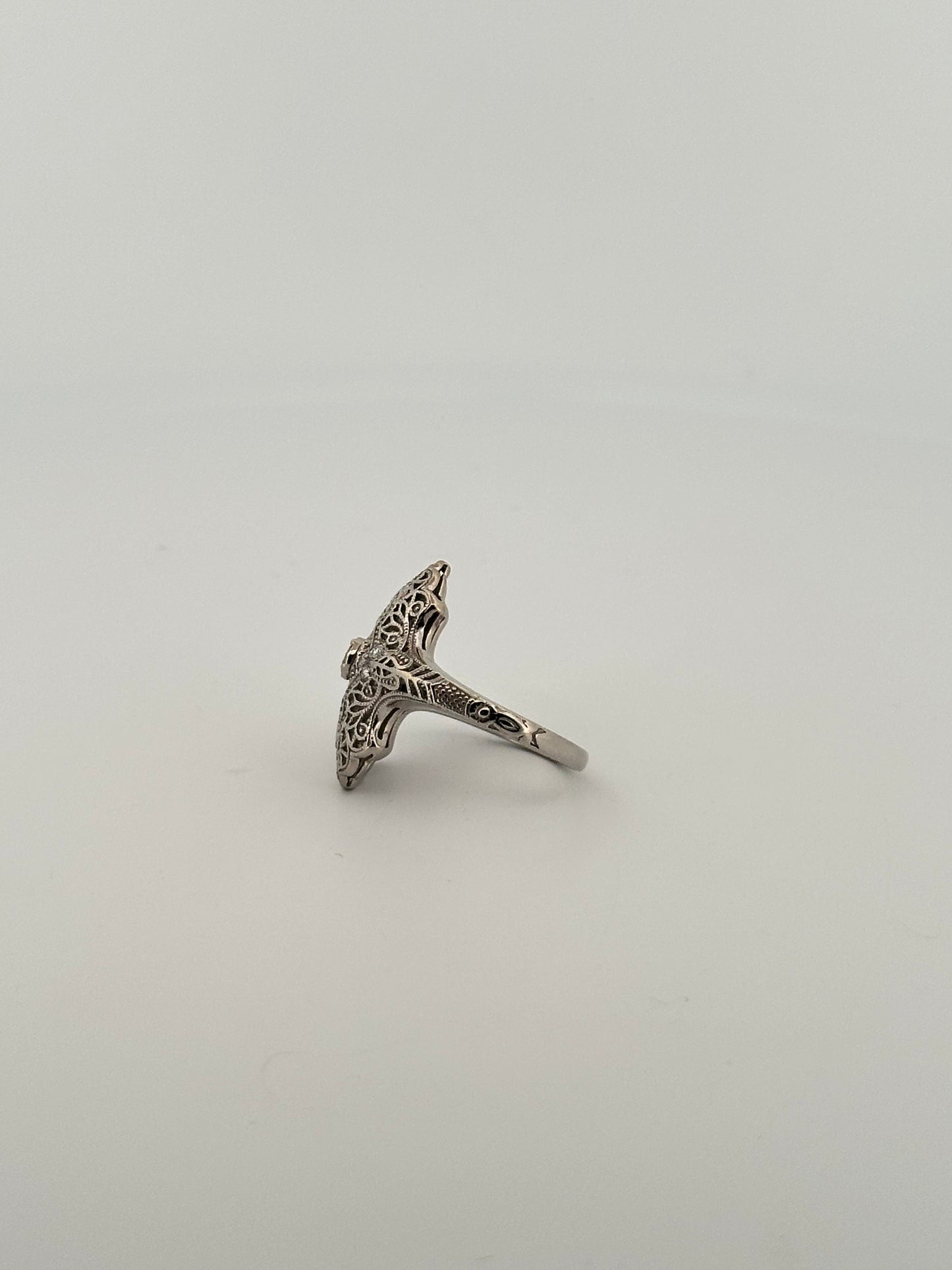 Antique art deco 14k white gold shield ring with natural diamonds