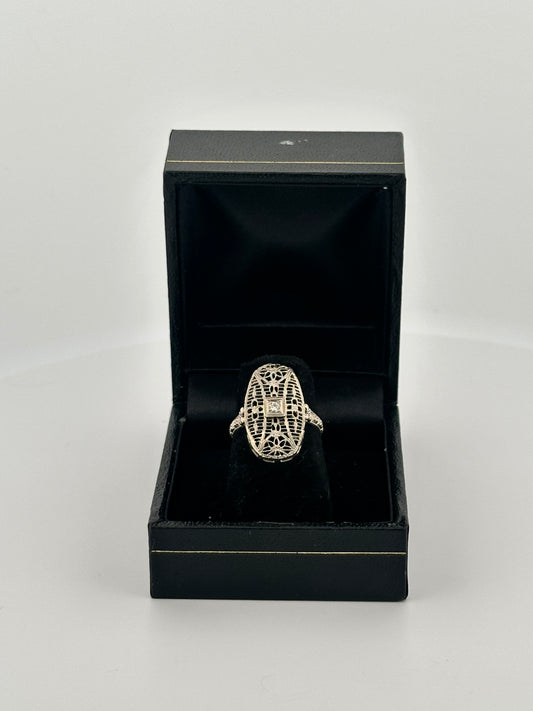 Antique art deco 18k white gold shield ring with natural diamonds