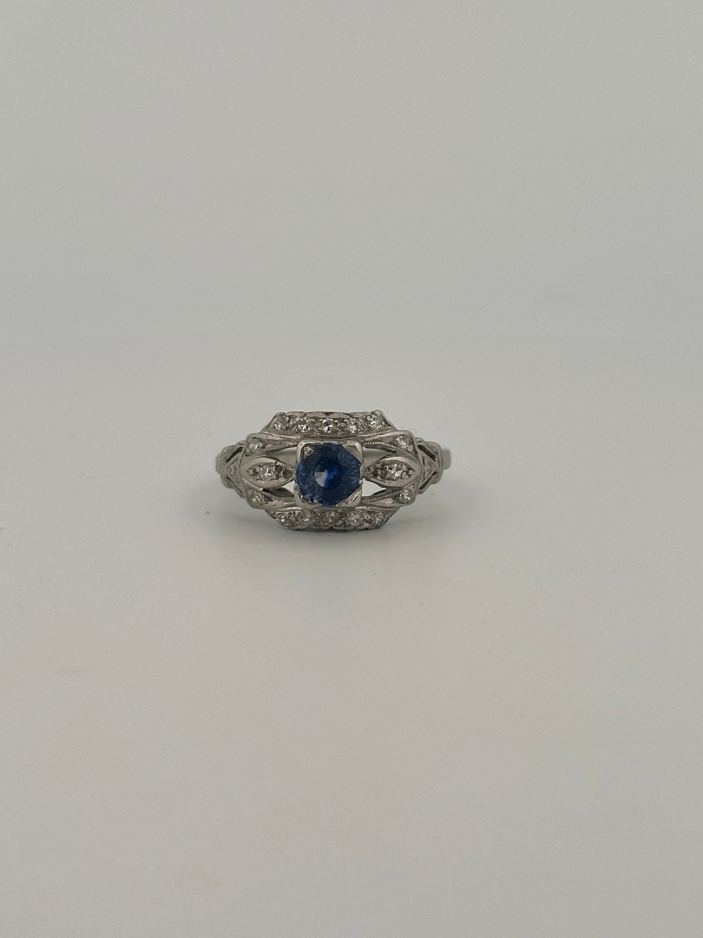 Antique art deco Ceylon sapphire and diamond ring in platinum
