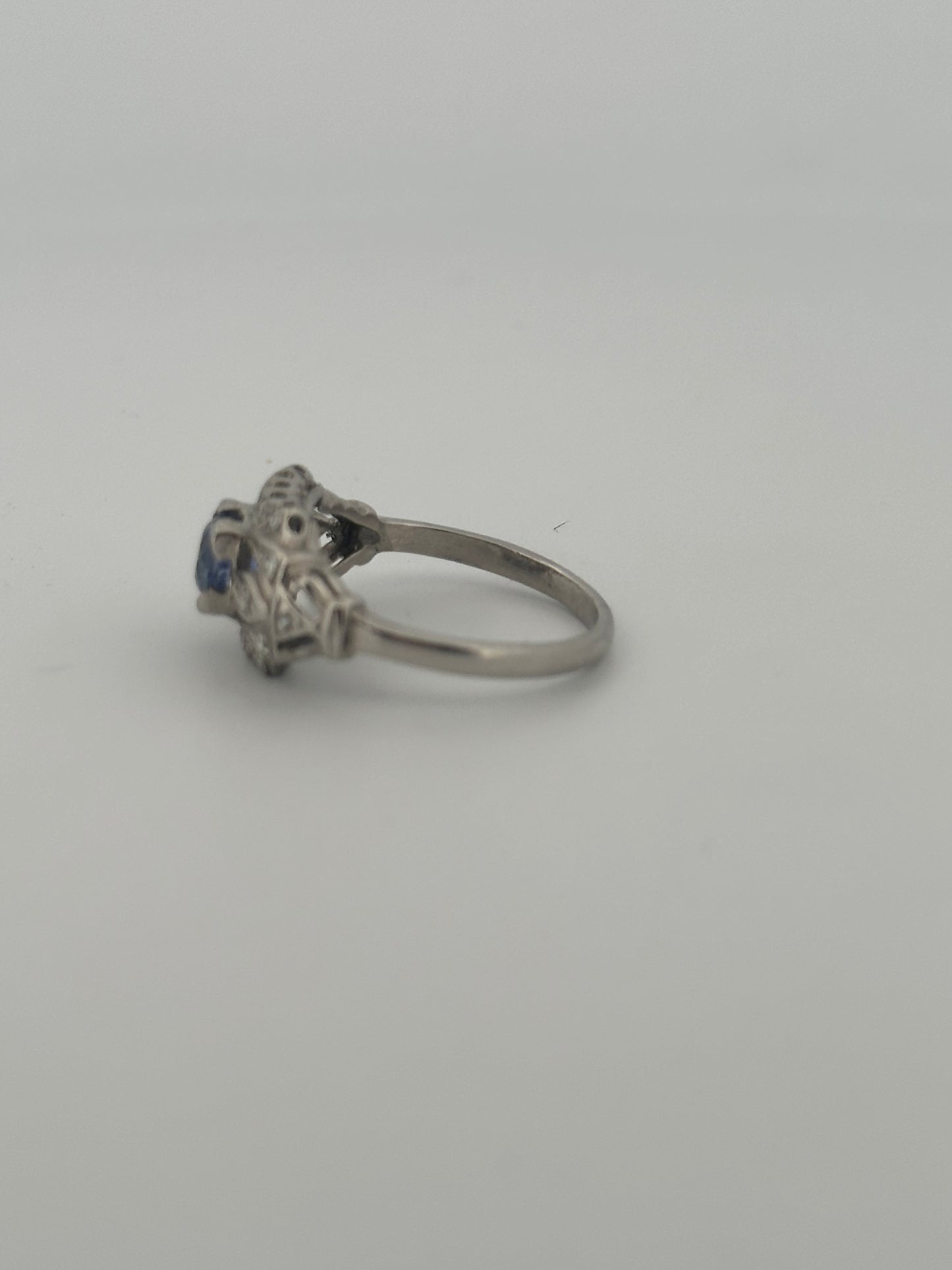 Antique art deco Ceylon sapphire and diamond ring in platinum