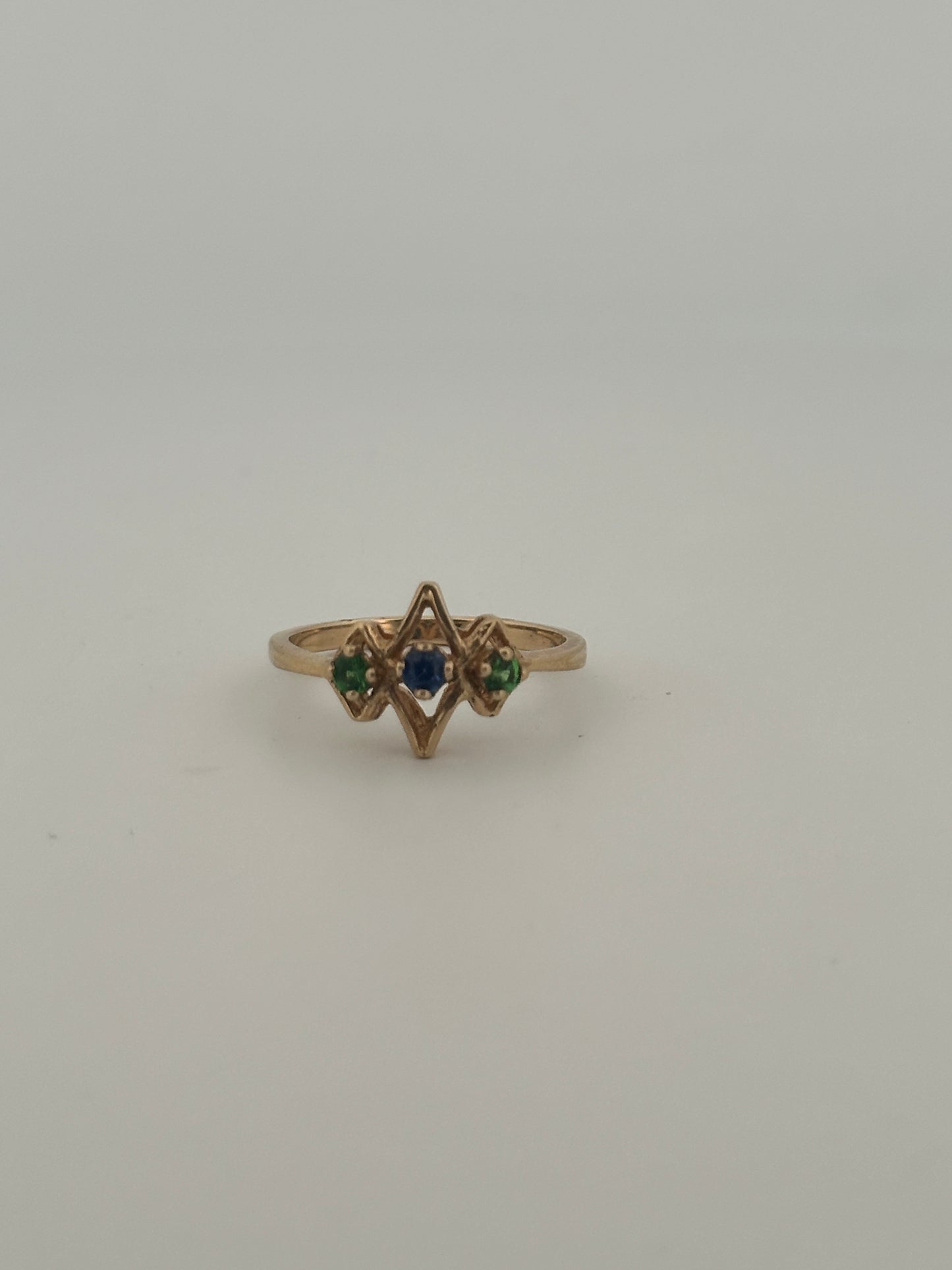 Vintage sapphire and tsavorite ring in 14k yellow gold