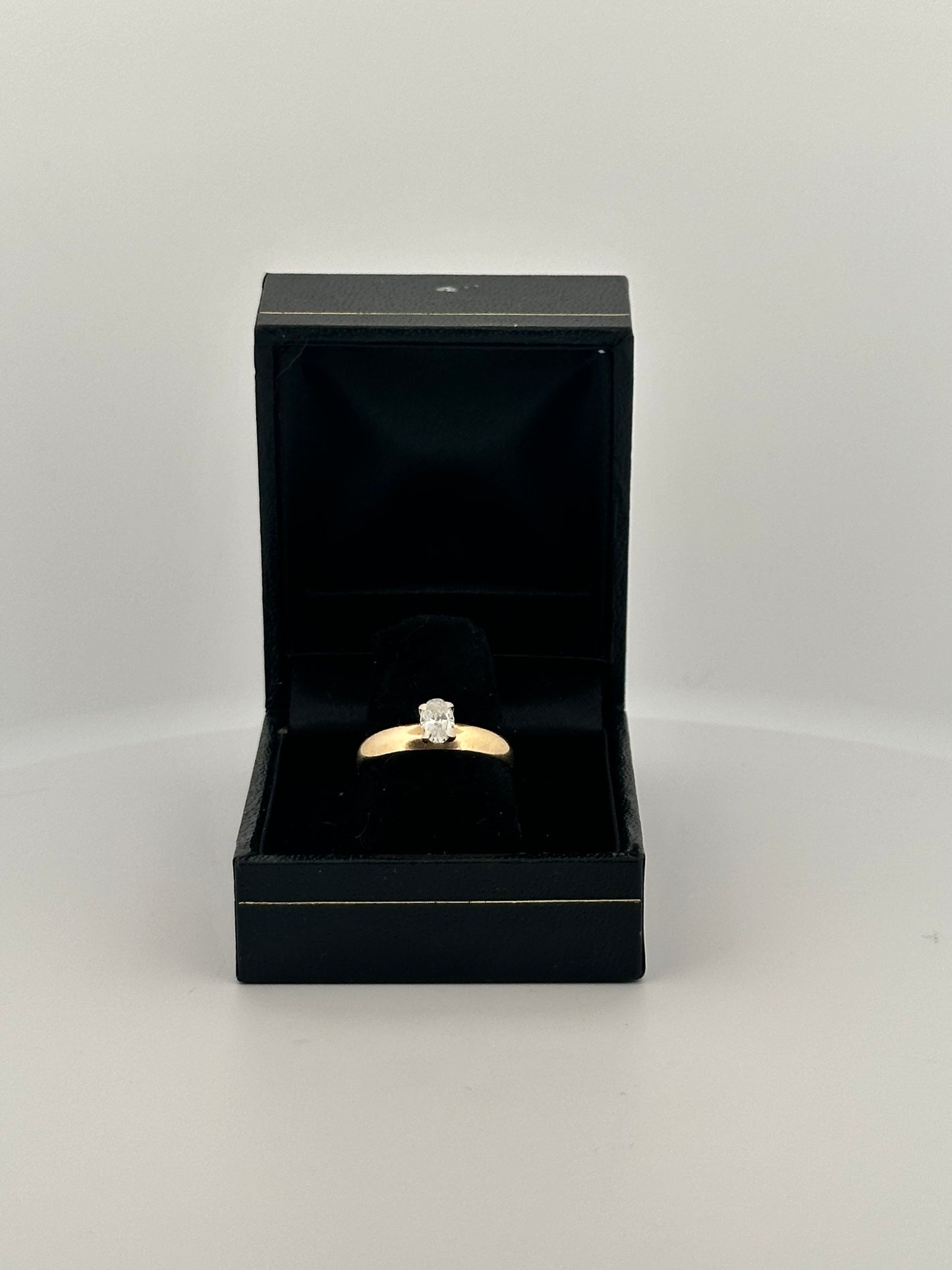 Vintage natural cut oval diamond solitaire ring on thick 14k yellow gold band