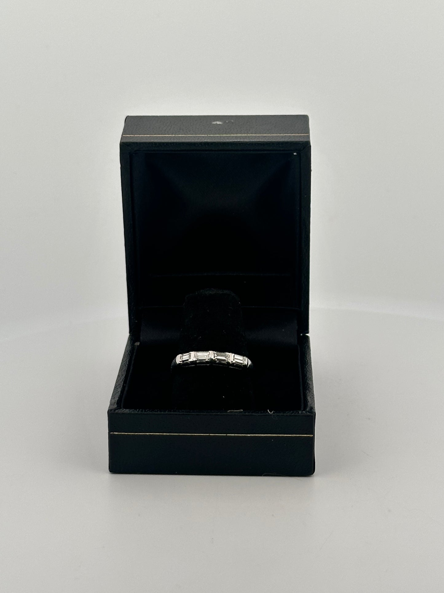 Natural baguette diamond half eternity band in 14k white gold