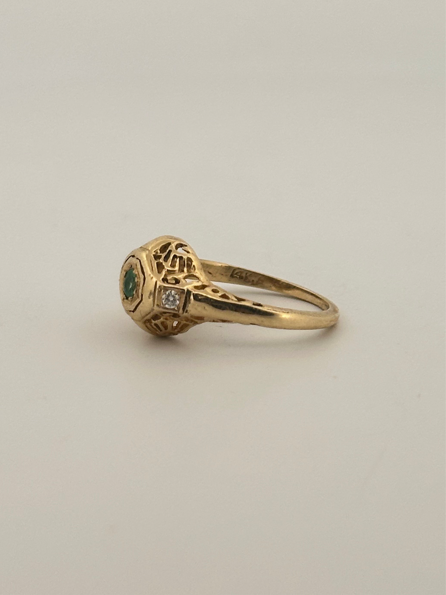 Antique natural emerald and diamond ring in 14k yellow gold