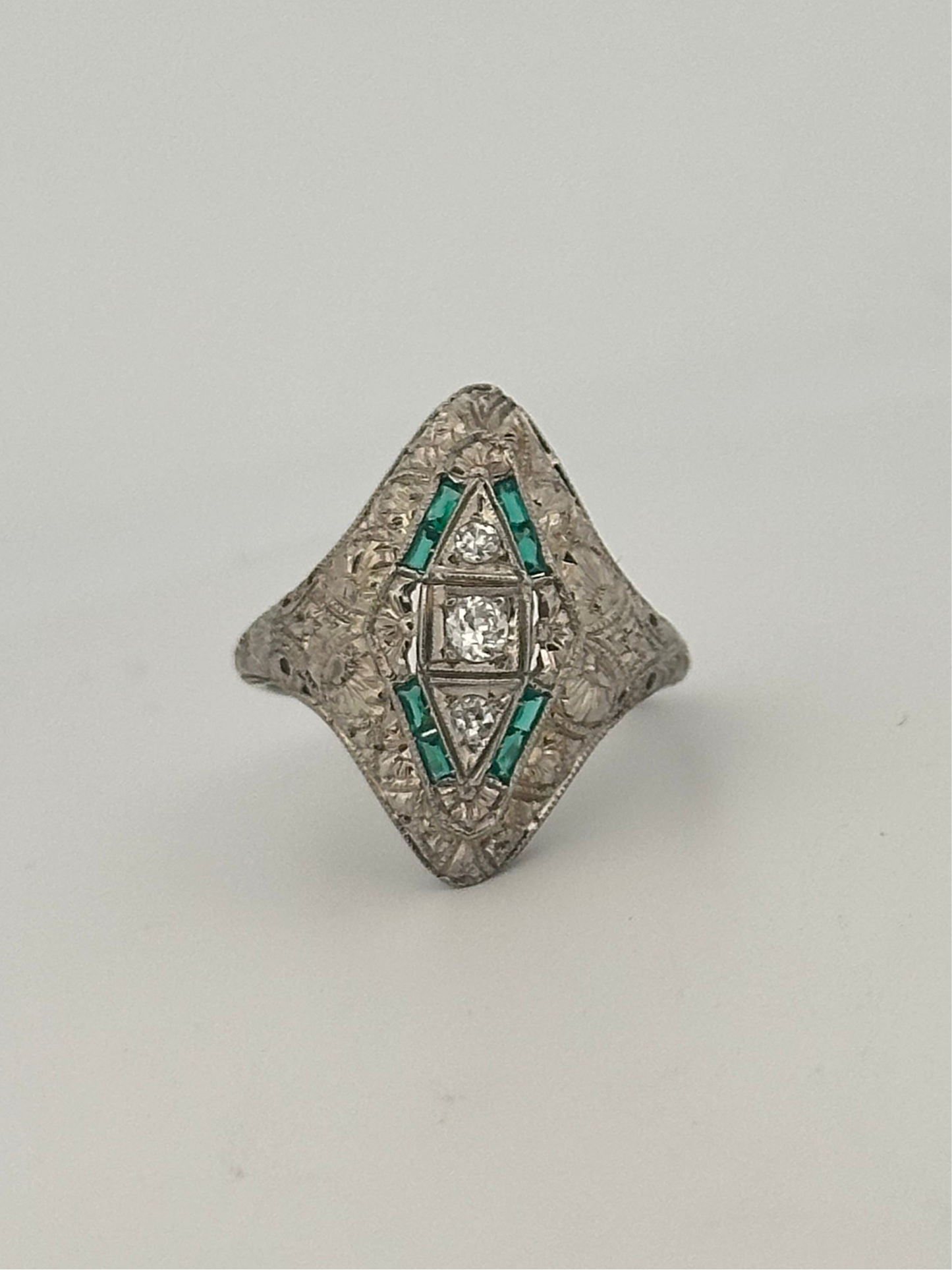Antique 18k white gold natural diamond and emerald shield ring