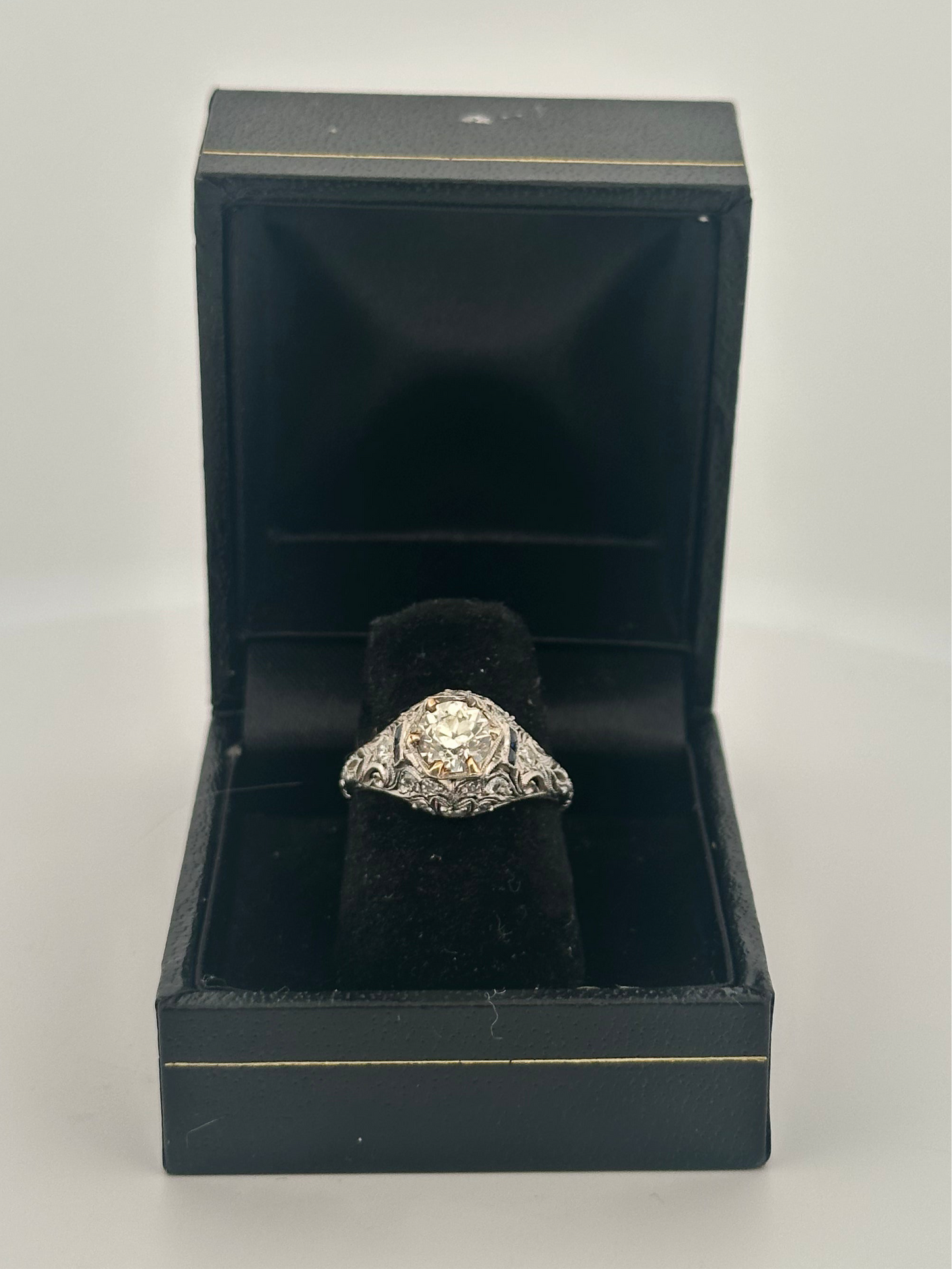 Antique art deco platinum old European cut diamond ring with sapphire accents