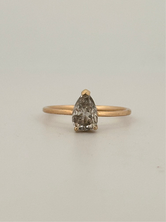 Vintage natural pear shaped diamond solitaire ring in 14k yellow gold