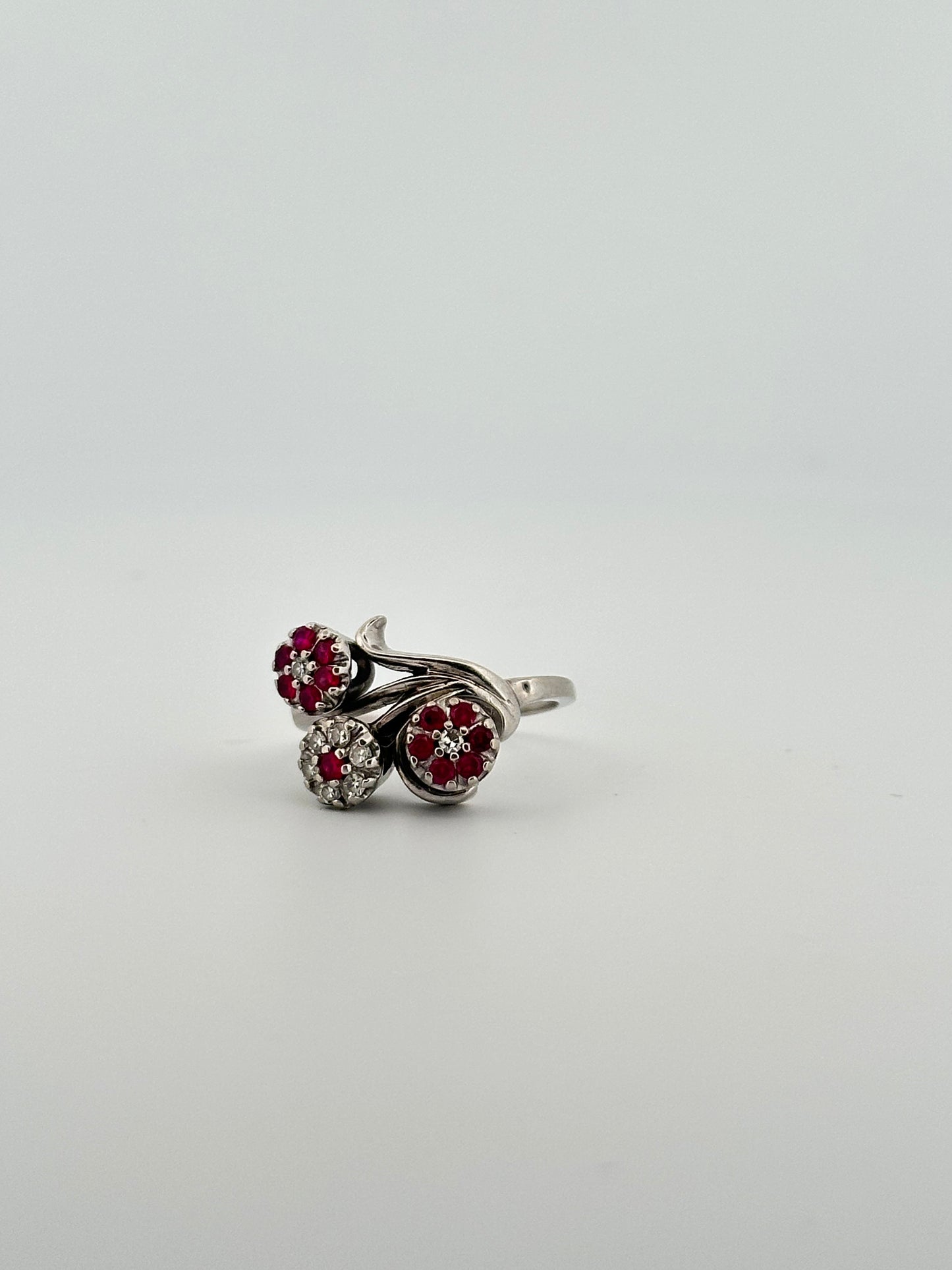 Vintage ruby and diamond floral cocktail ring in 14k white gold