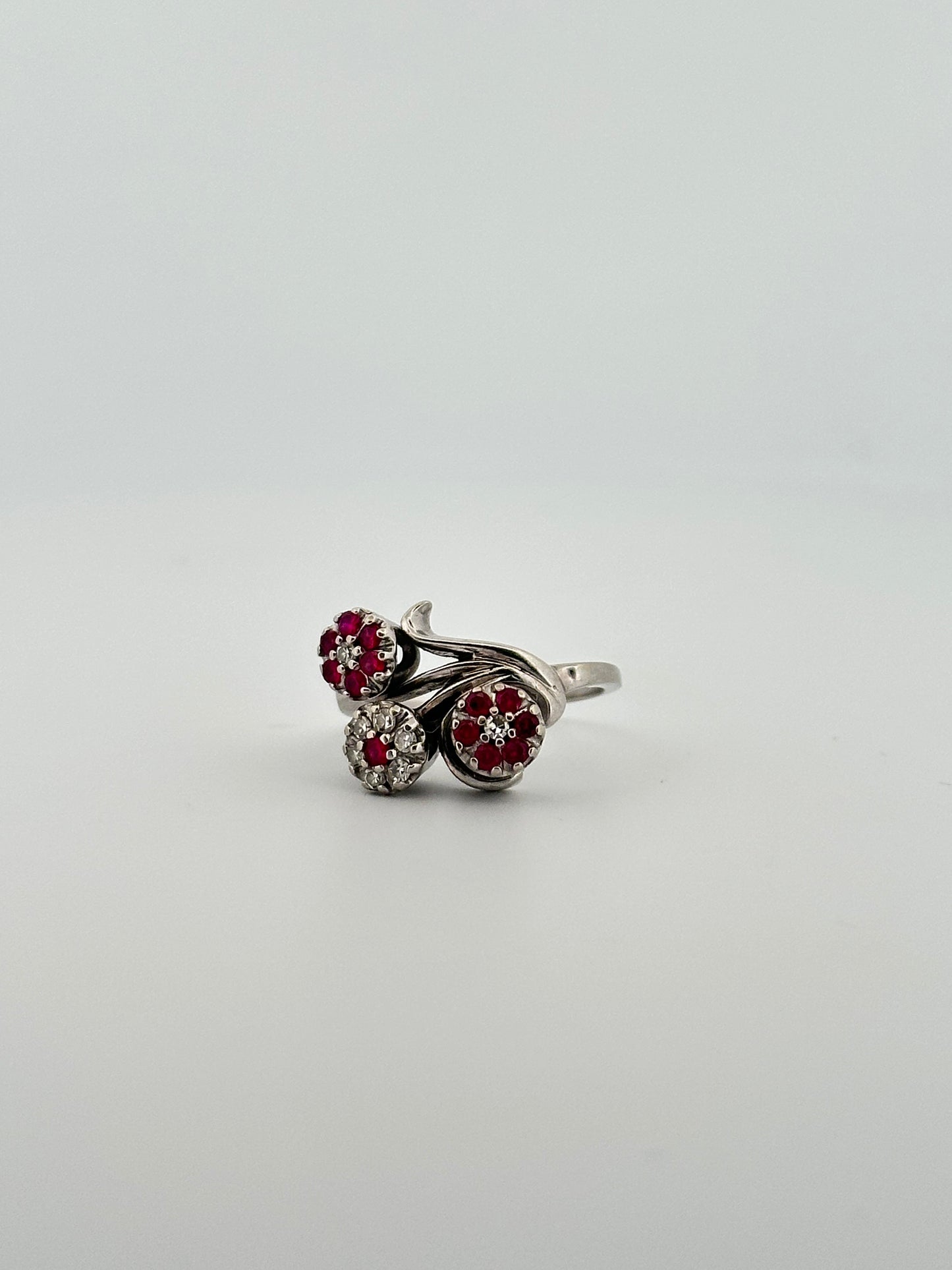 Vintage ruby and diamond floral cocktail ring in 14k white gold