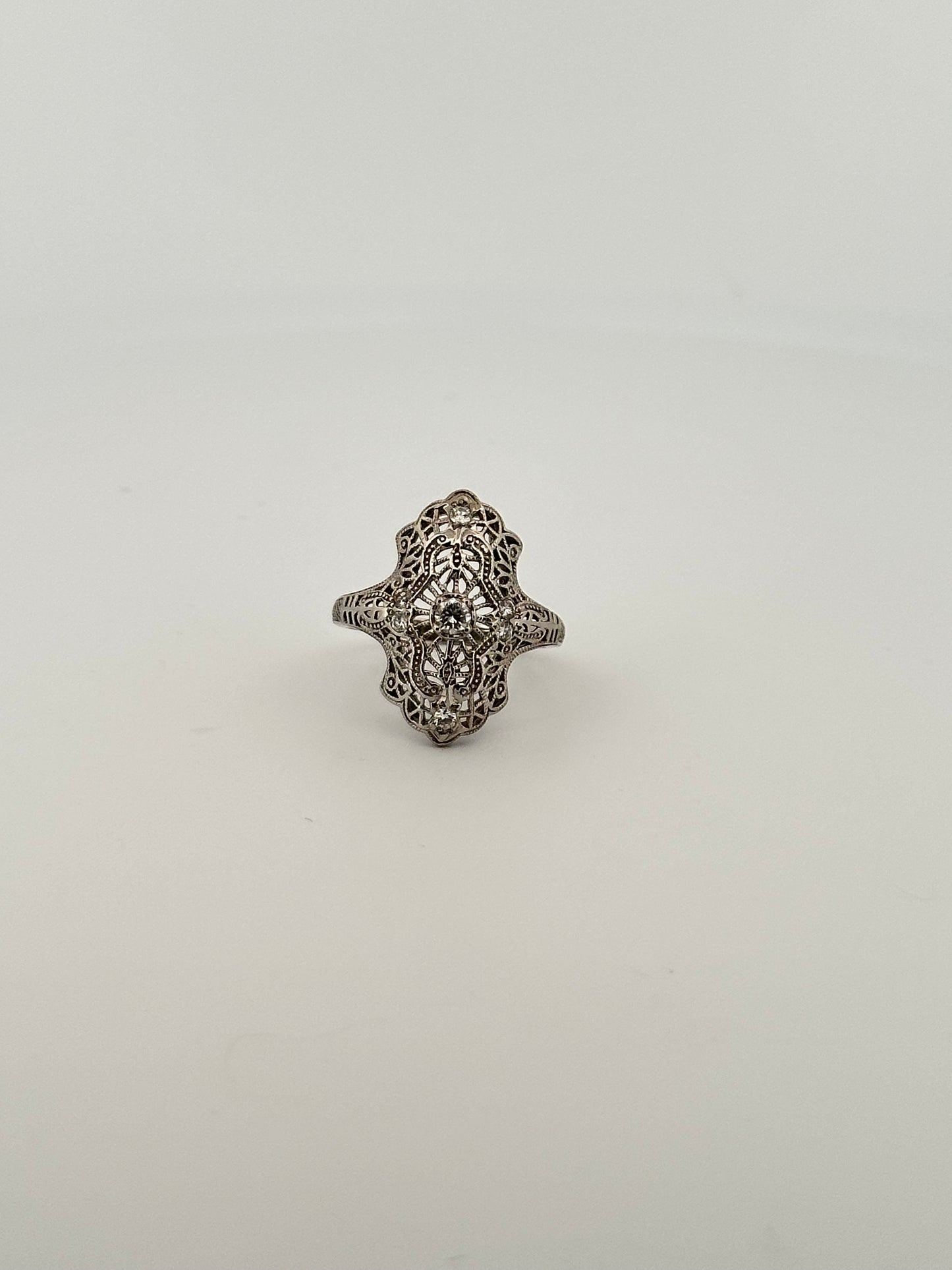 Antique art deco 14k white gold shield ring with natural diamonds