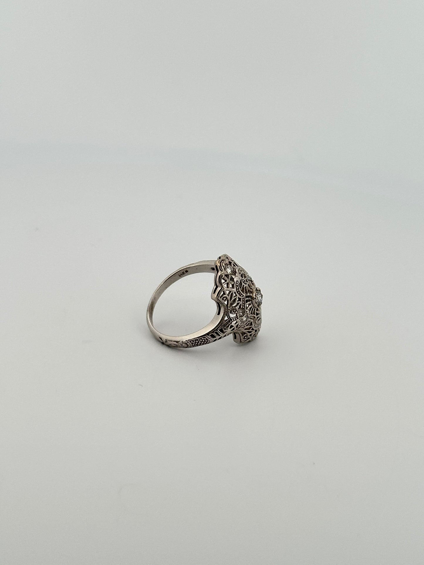 Antique art deco 14k white gold shield ring with natural diamonds