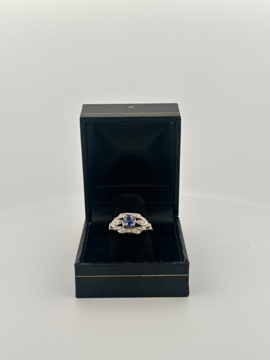 Antique art deco Ceylon sapphire and diamond ring in platinum
