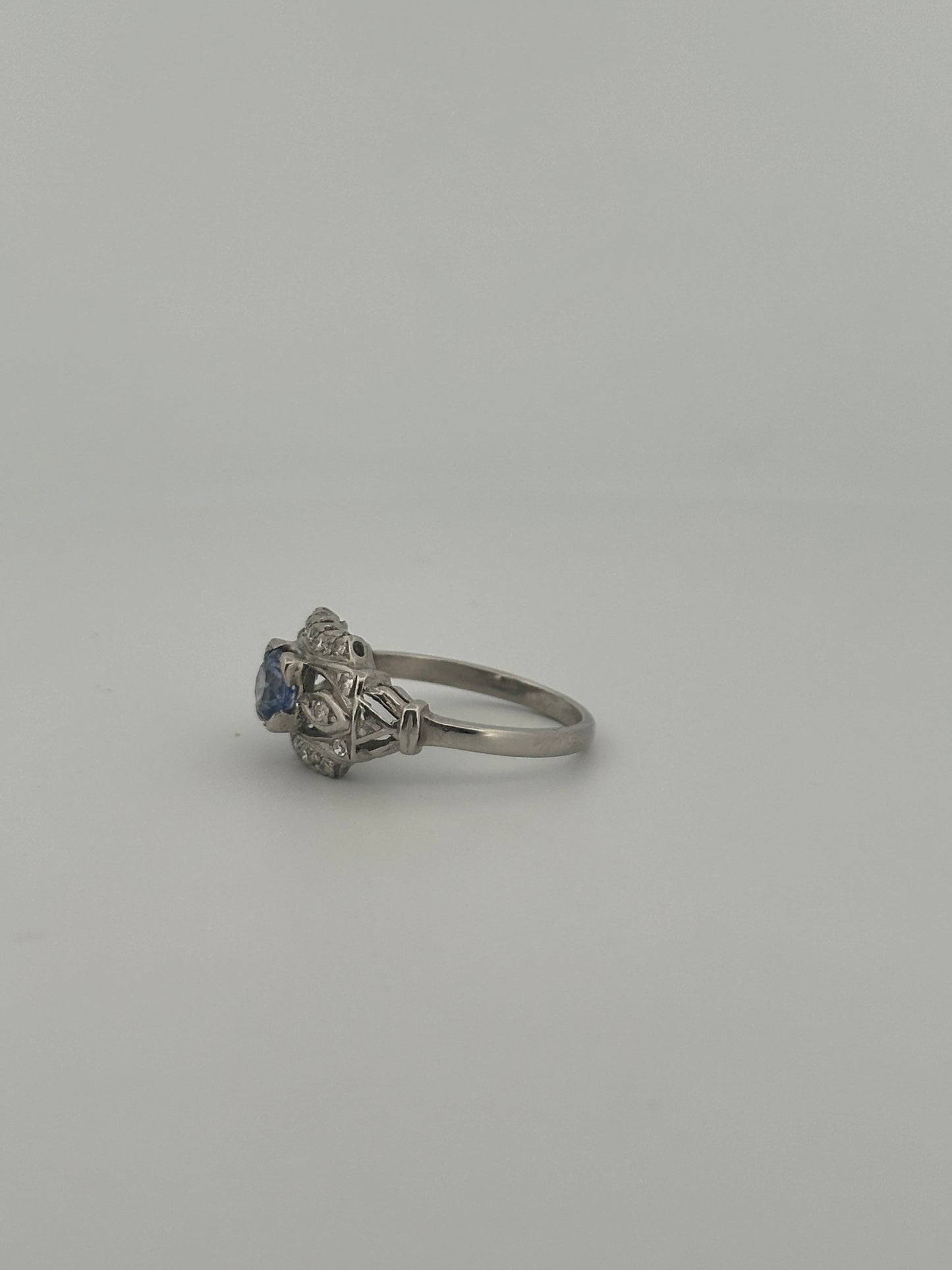 Antique art deco Ceylon sapphire and diamond ring in platinum