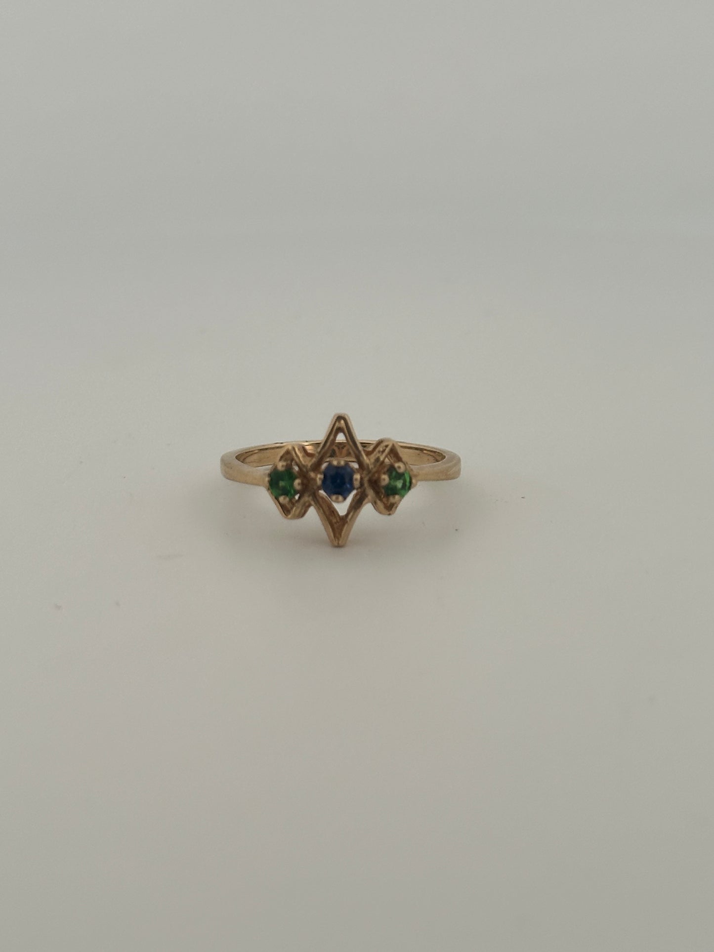 Vintage sapphire and tsavorite ring in 14k yellow gold