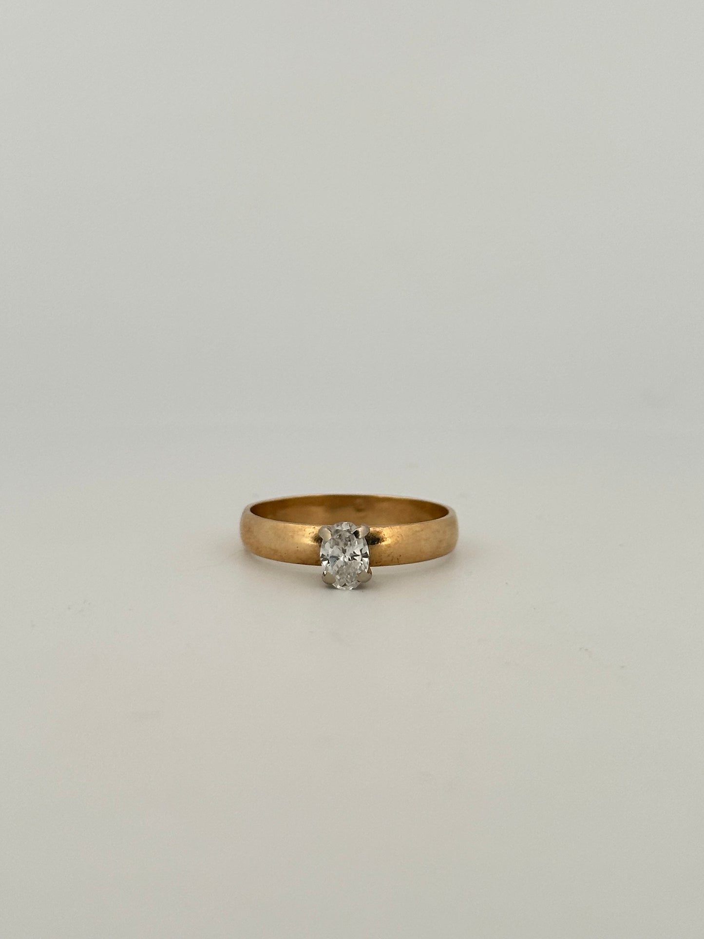 Vintage natural cut oval diamond solitaire ring on thick 14k yellow gold band