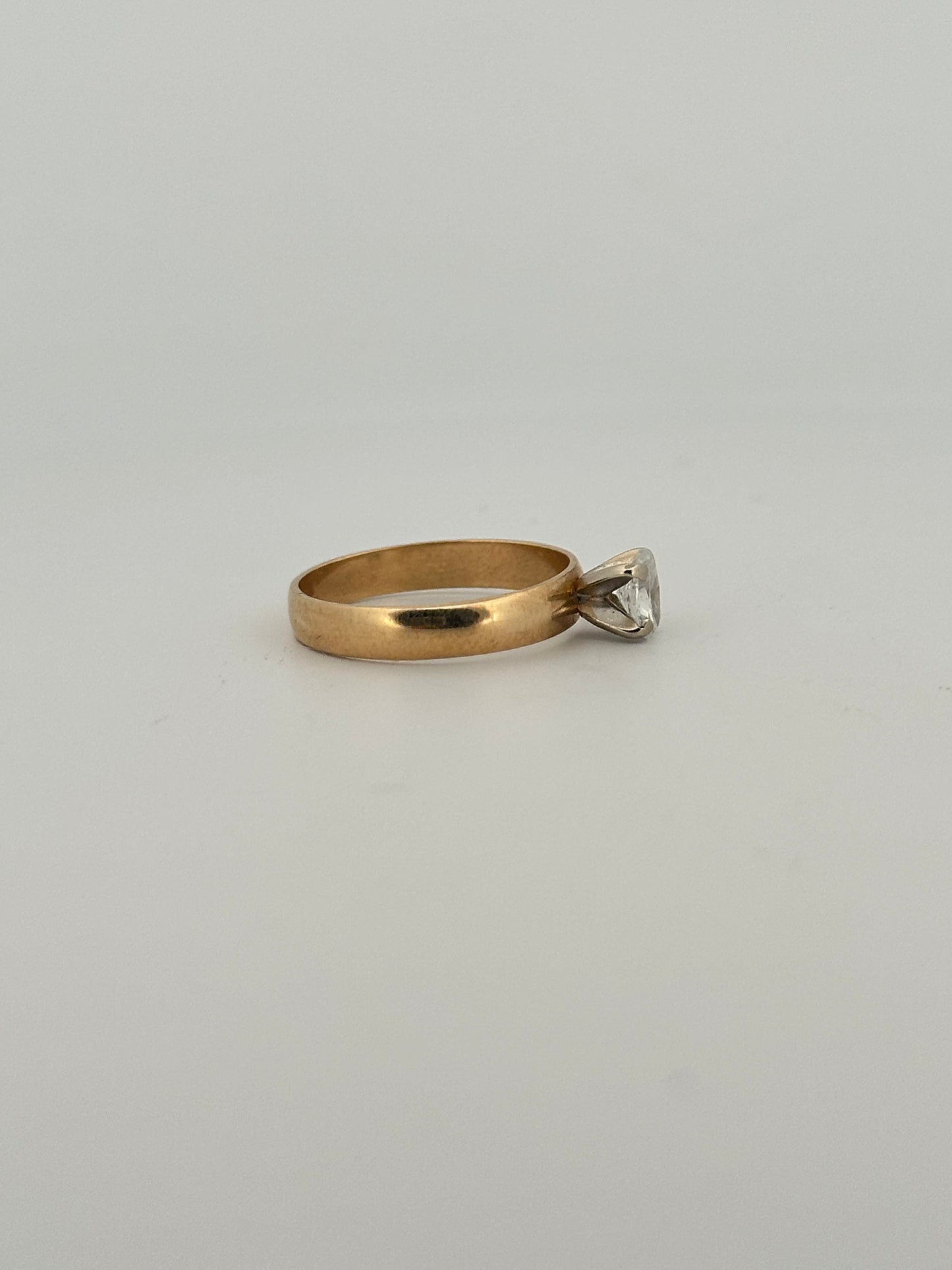 Vintage natural cut oval diamond solitaire ring on thick 14k yellow gold band