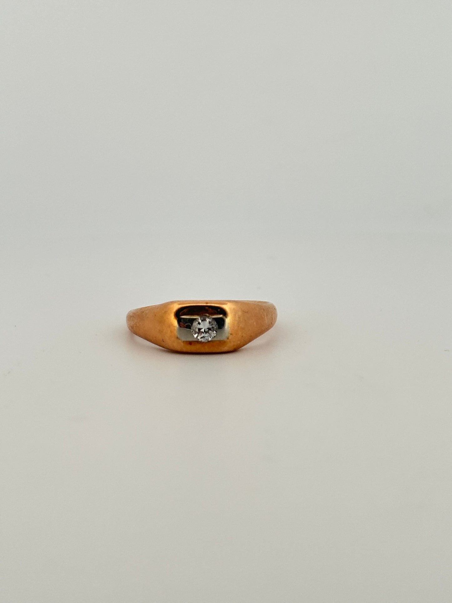 Antique two toned rose and white gold signet ring in 14k with a natural diamond