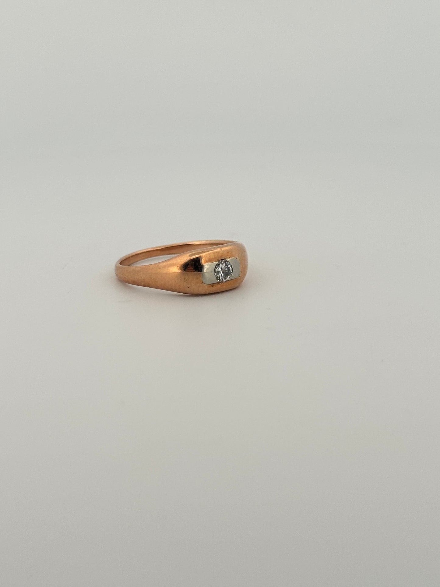 Antique two toned rose and white gold signet ring in 14k with a natural diamond