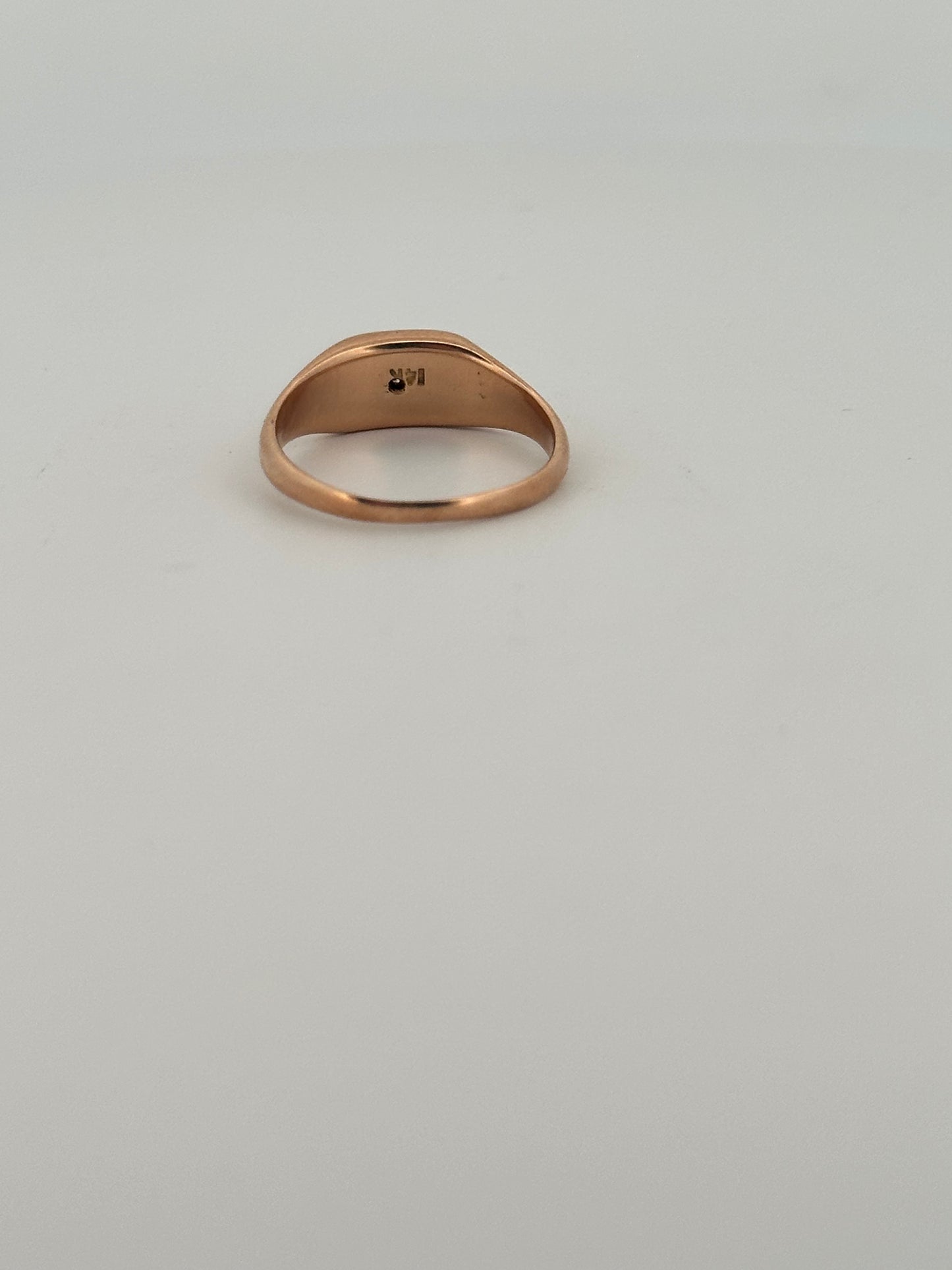 Antique two toned rose and white gold signet ring in 14k with a natural diamond