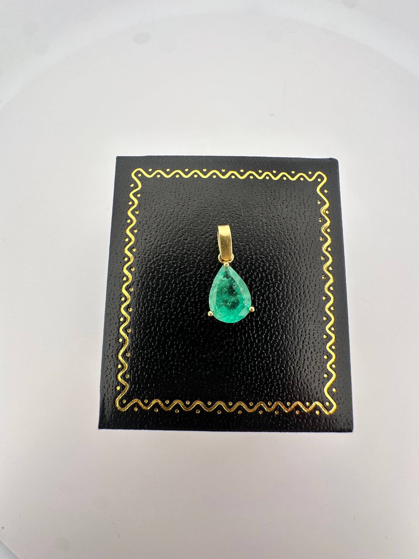 Vintage natural emerald pear shaped pendant set in 14k yellow gold