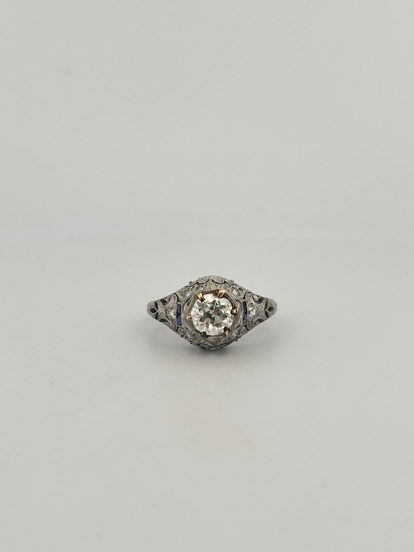 Antique art deco platinum old European cut diamond ring with sapphire accents