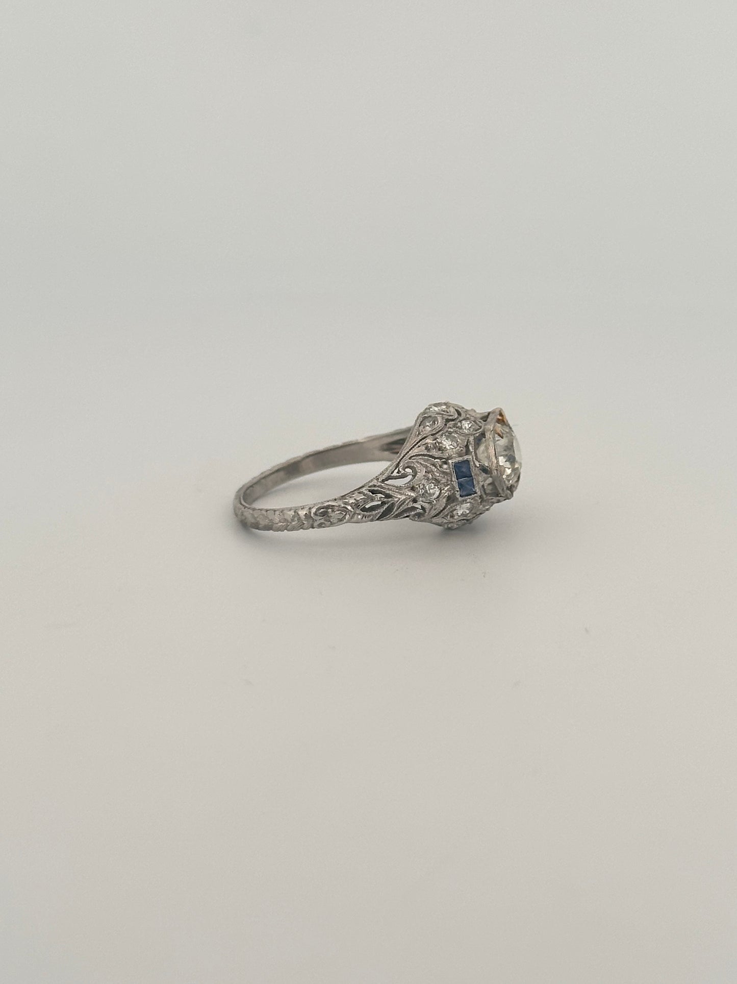 Antique art deco platinum old European cut diamond ring with sapphire accents