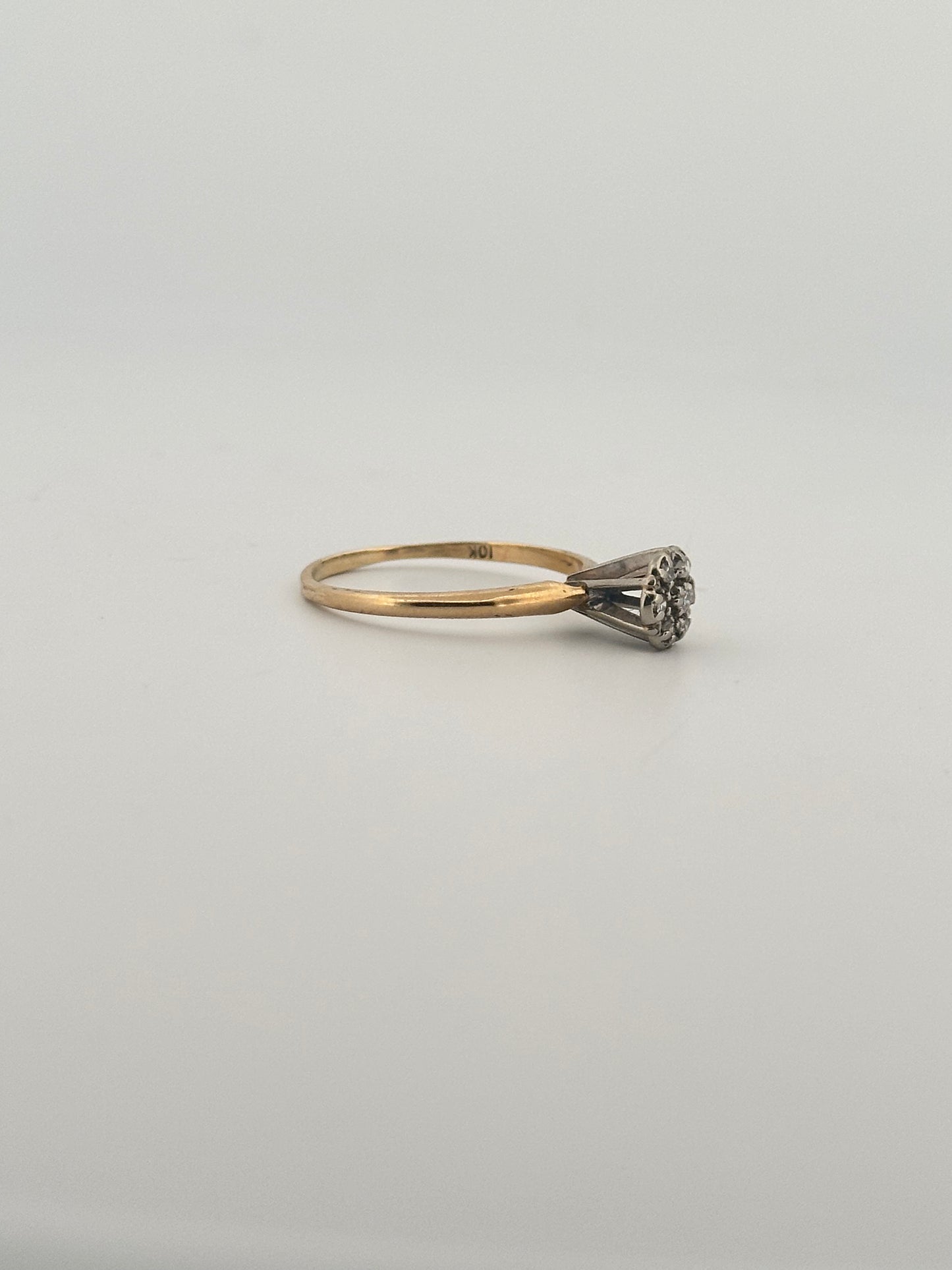 Vintage natural diamond cluster ring in 10k yellow gold