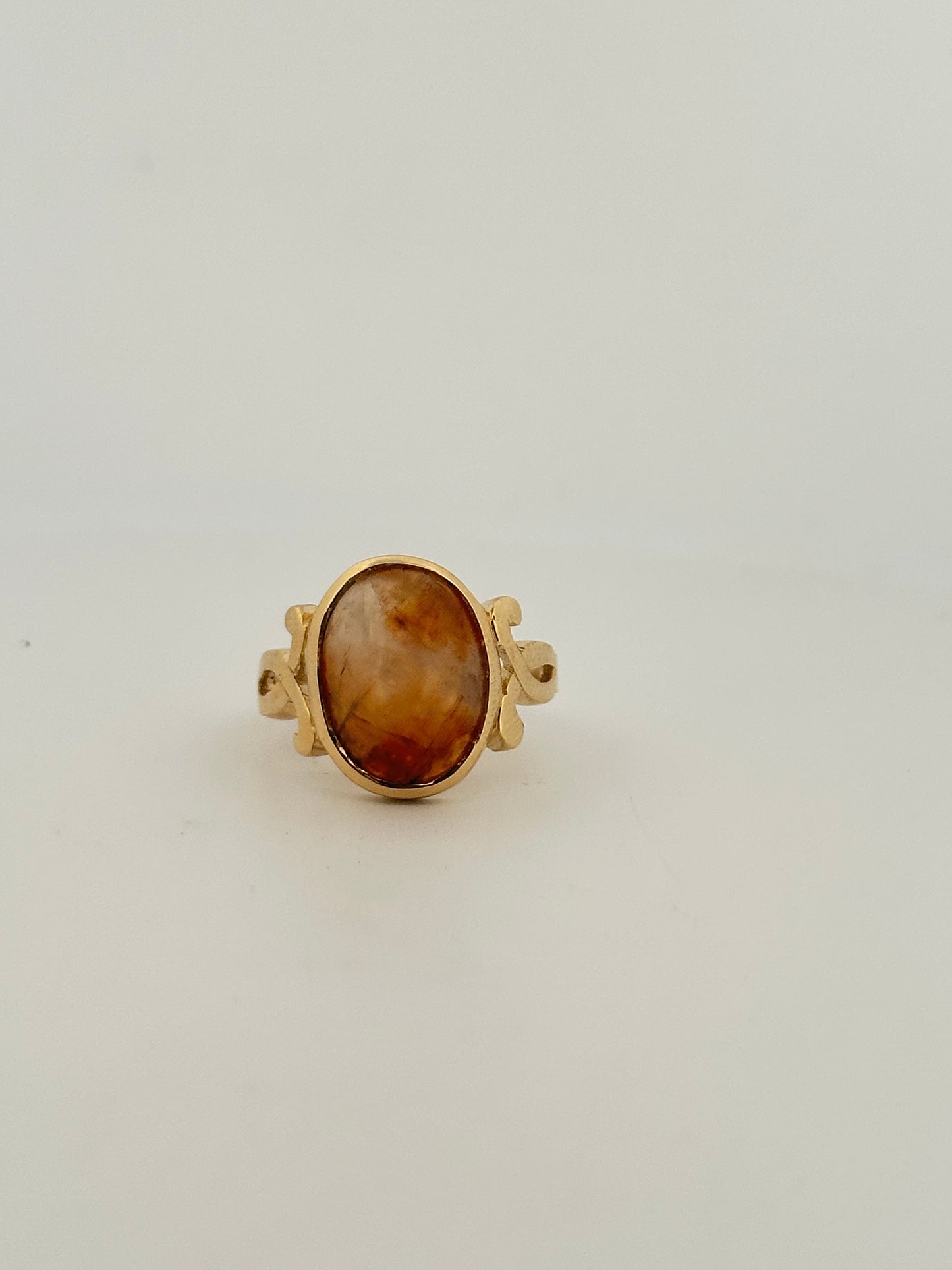 Fire agate cabochon ring in 10k yellow gold