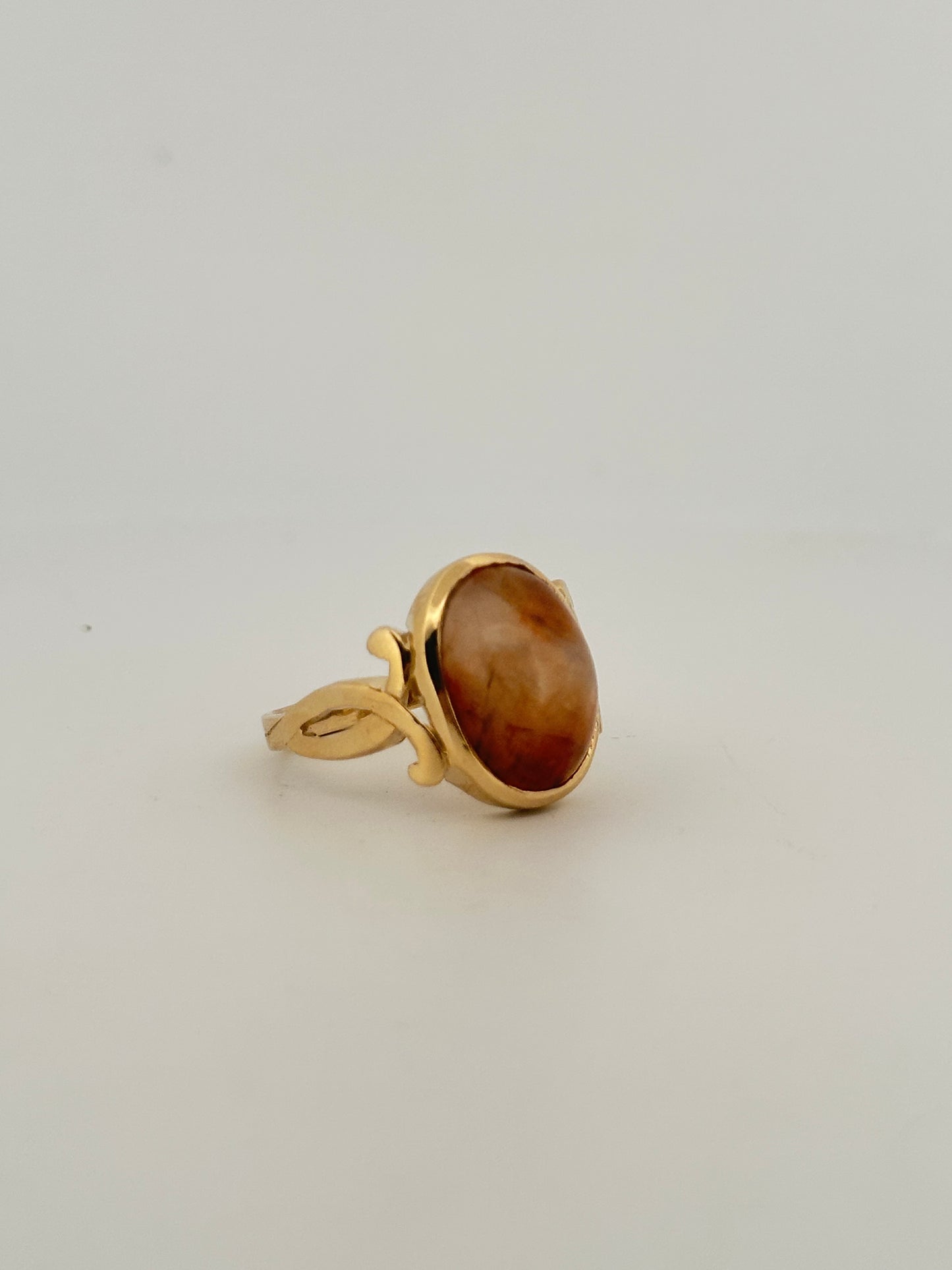 Fire agate cabochon ring in 10k yellow gold