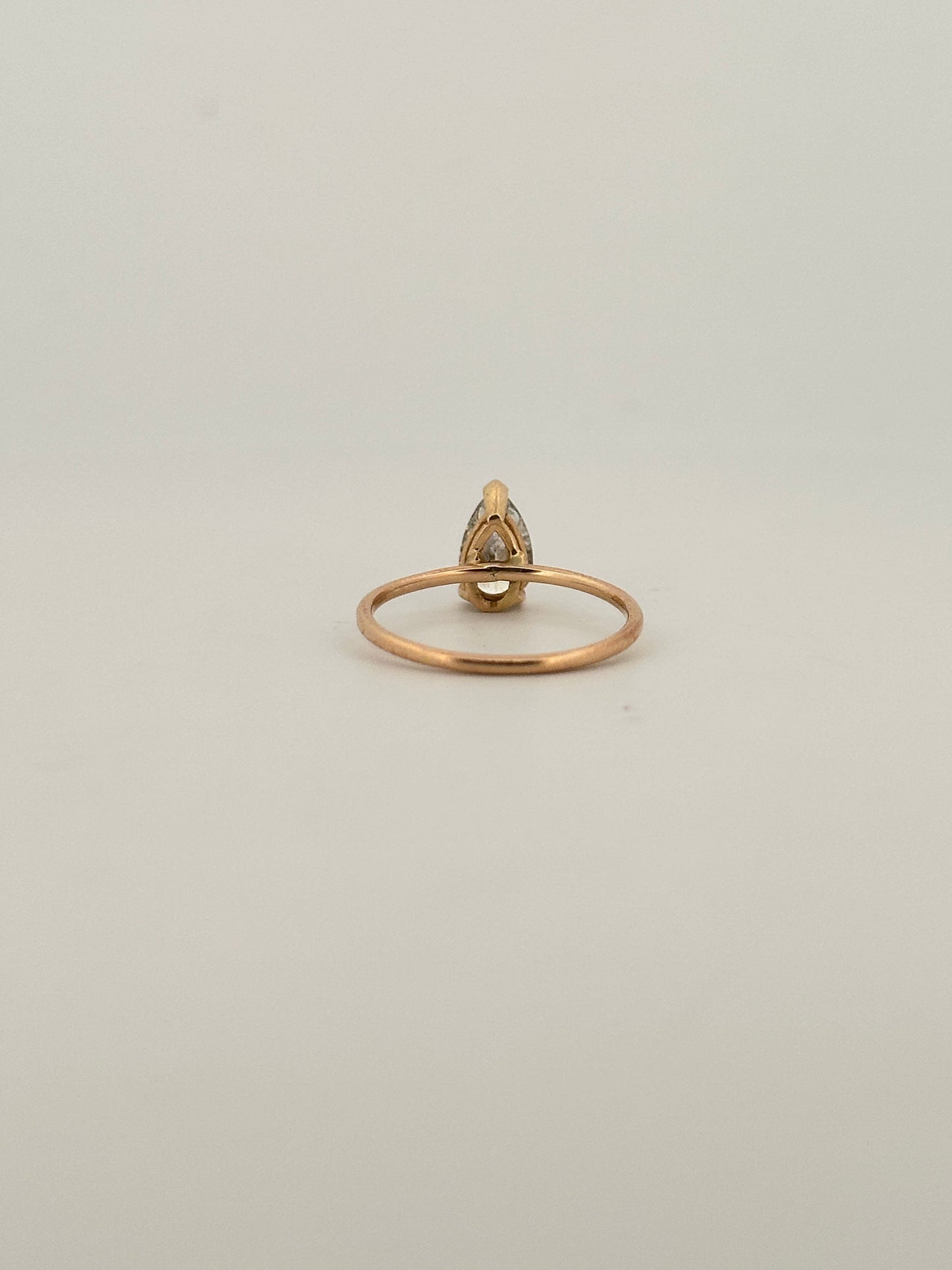 Vintage natural pear shaped diamond solitaire ring in 14k yellow gold