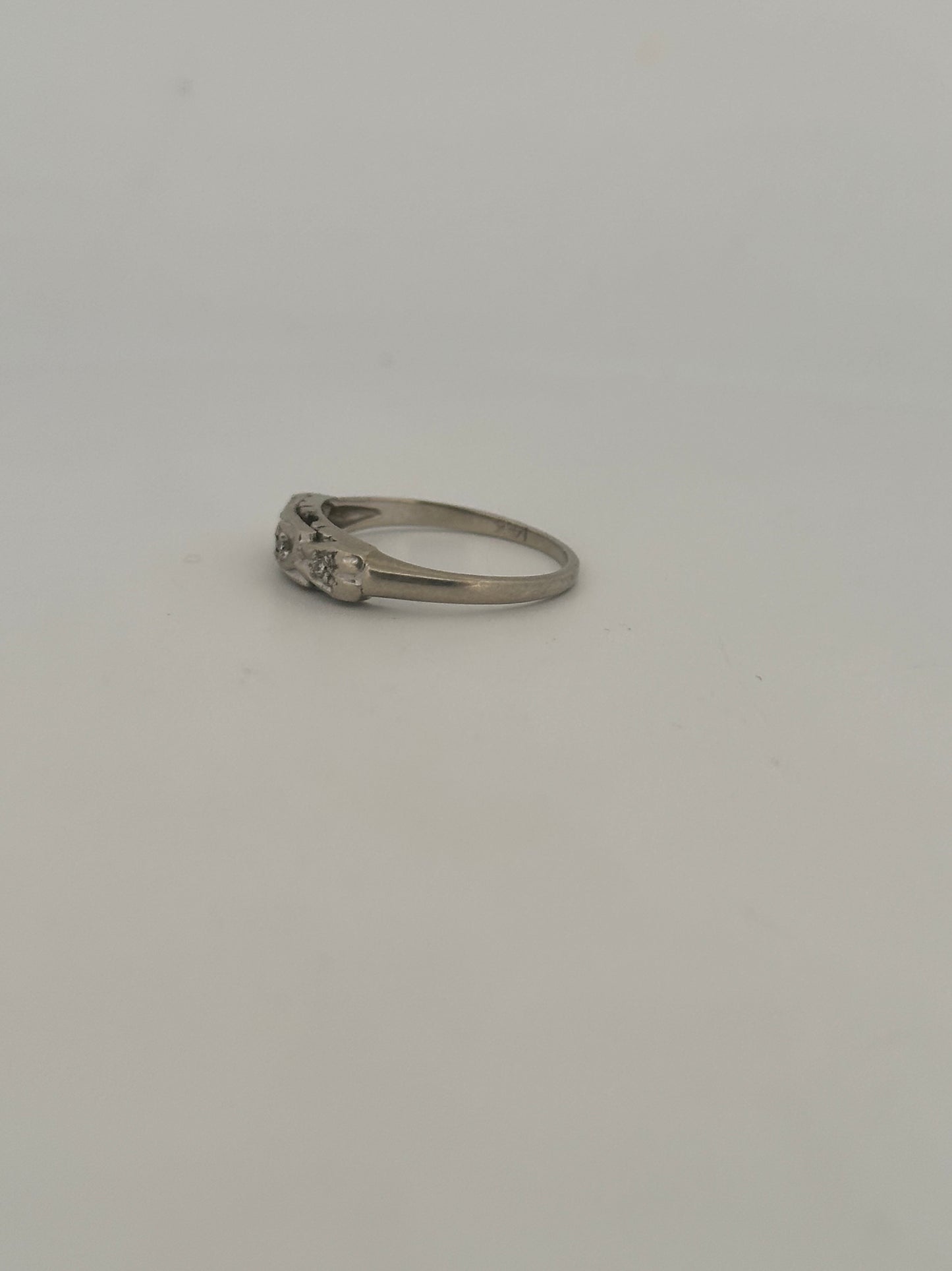 Vintage natural diamond bow stacker band in 14k white gold circa 1940s