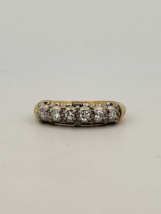 Vintage natural diamond half eternity band circa 1950s in 14k gold