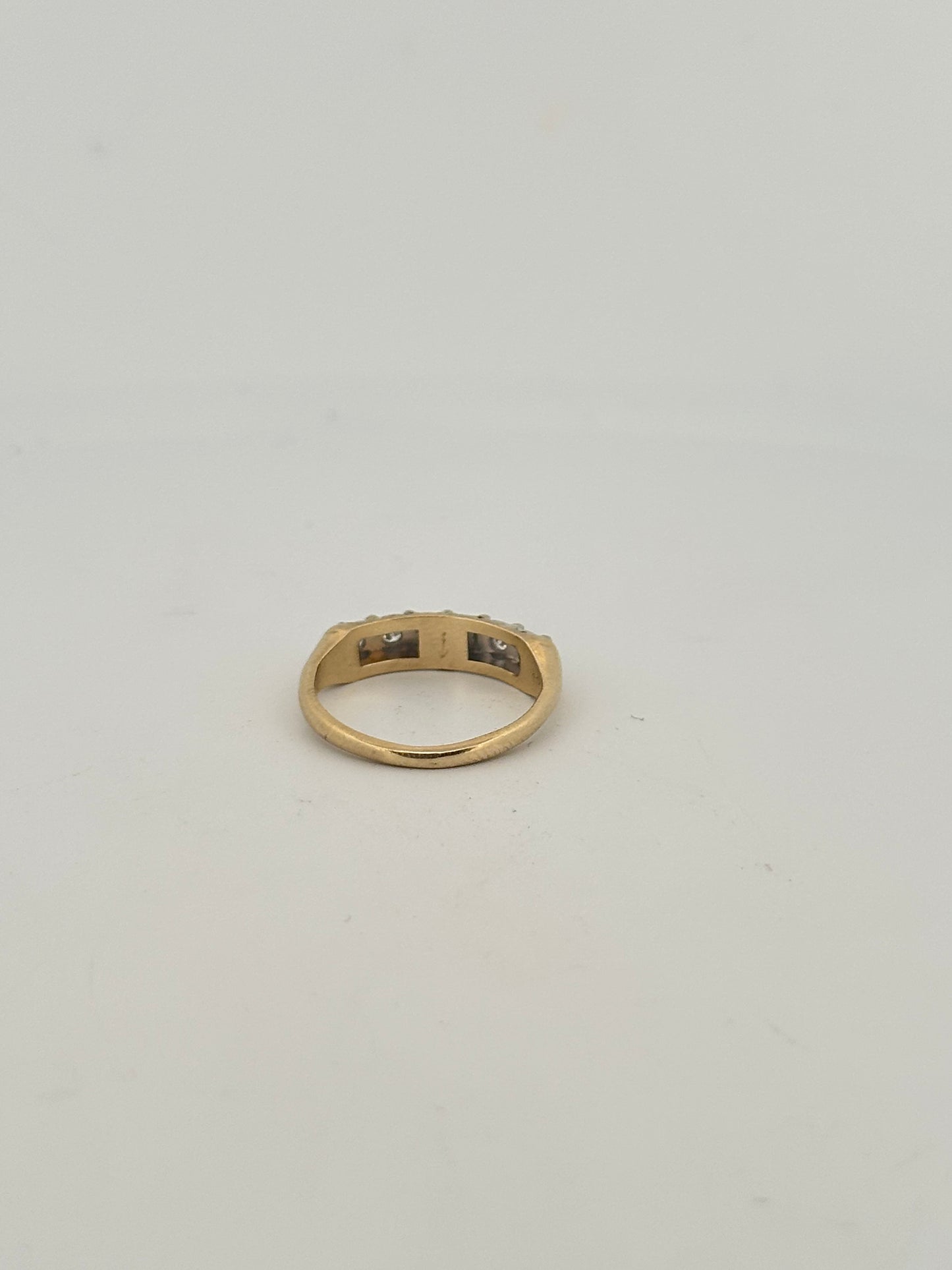 Vintage natural diamond half eternity band circa 1950s in 14k gold