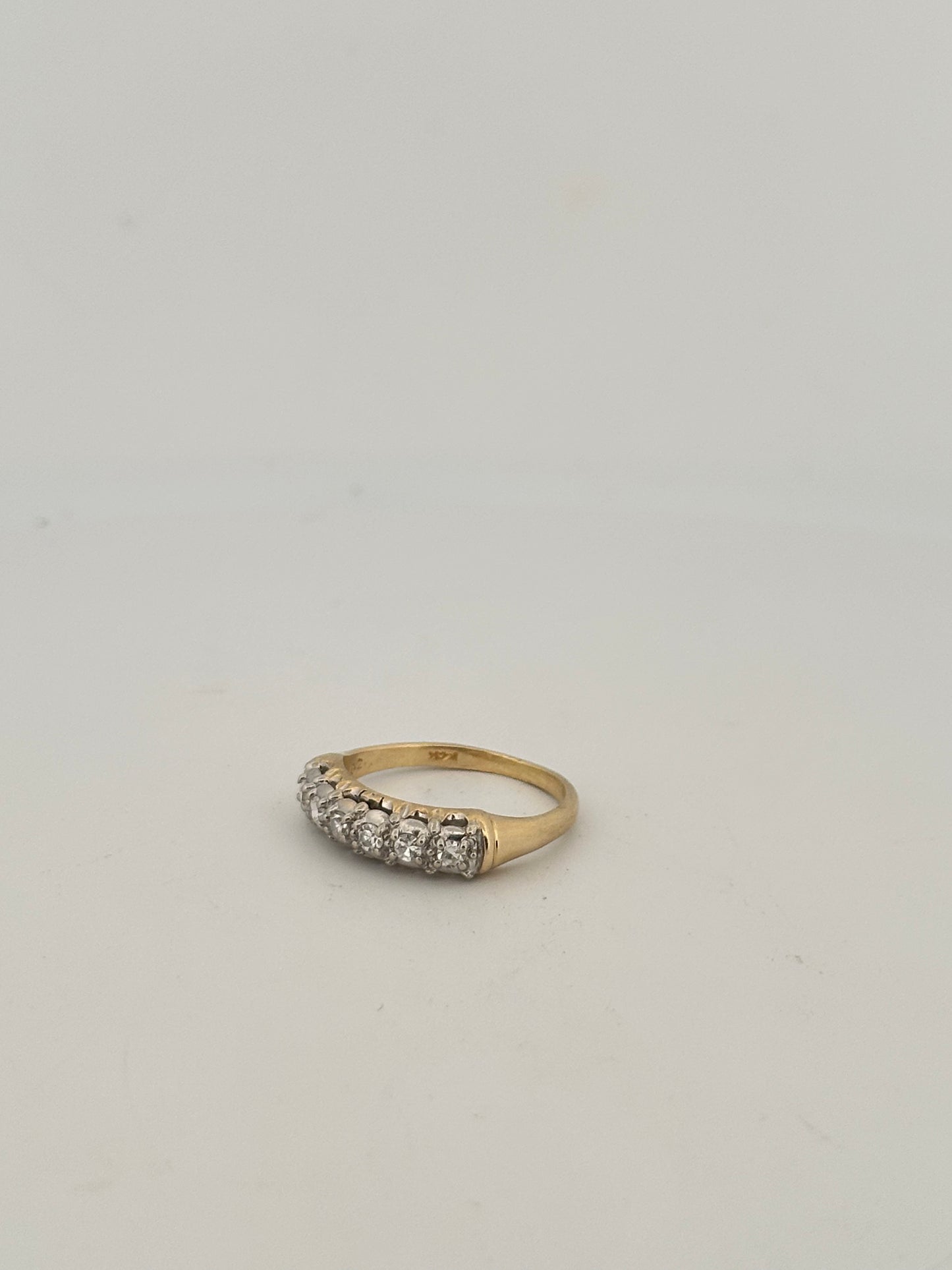 Vintage natural diamond half eternity band circa 1950s in 14k gold