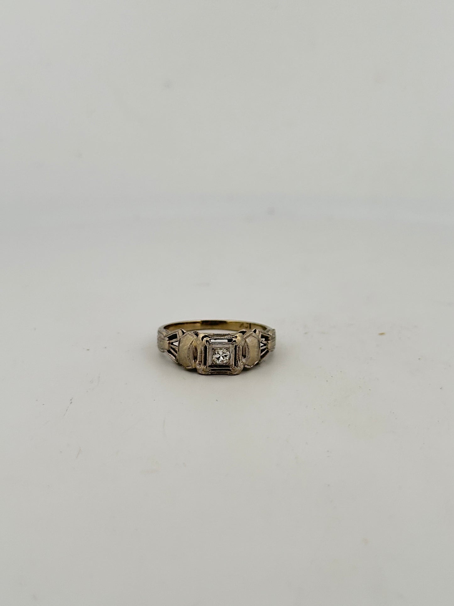 Antique art deco diamond solitaire in 18k white gold