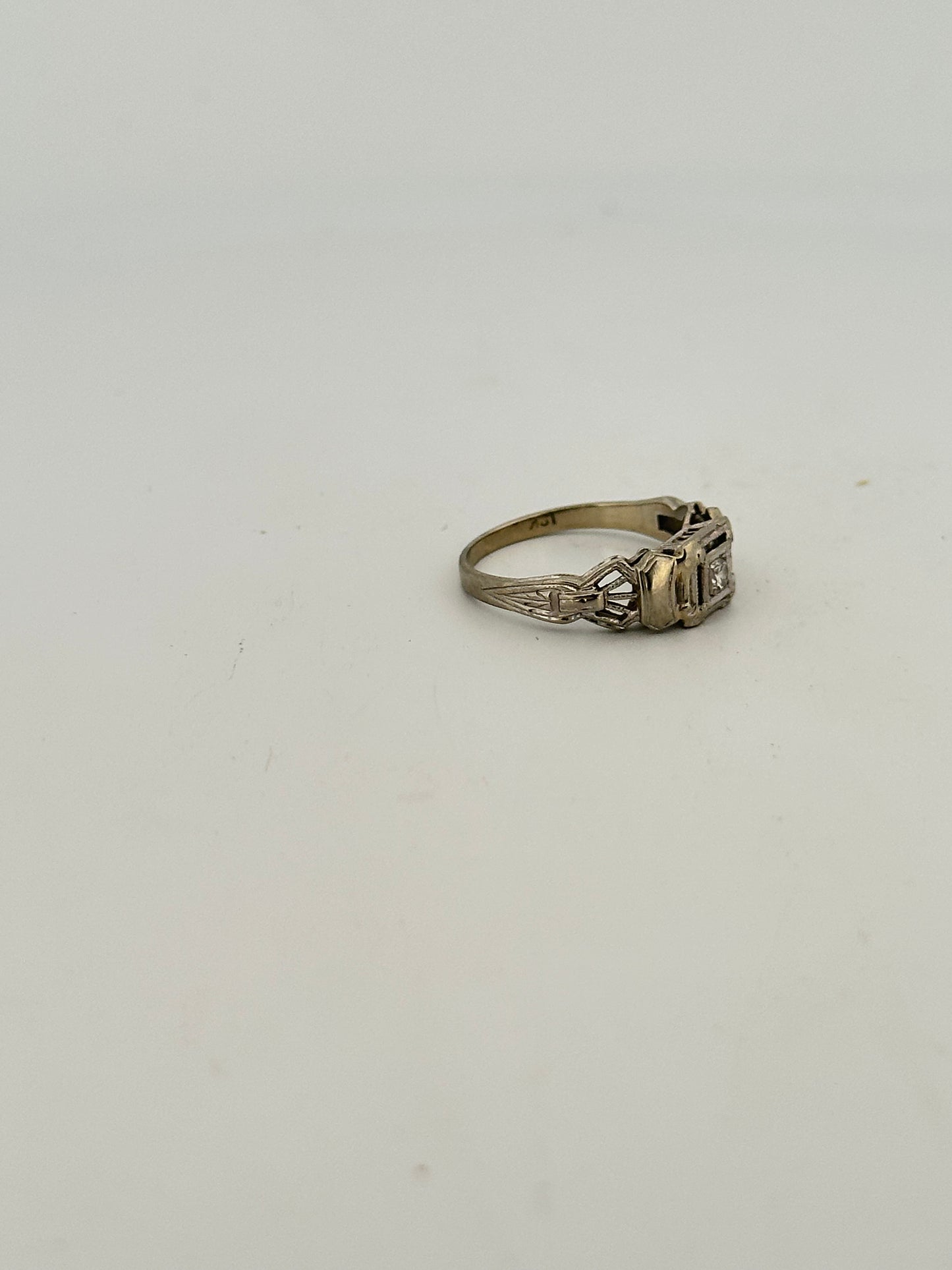Antique art deco diamond solitaire in 18k white gold