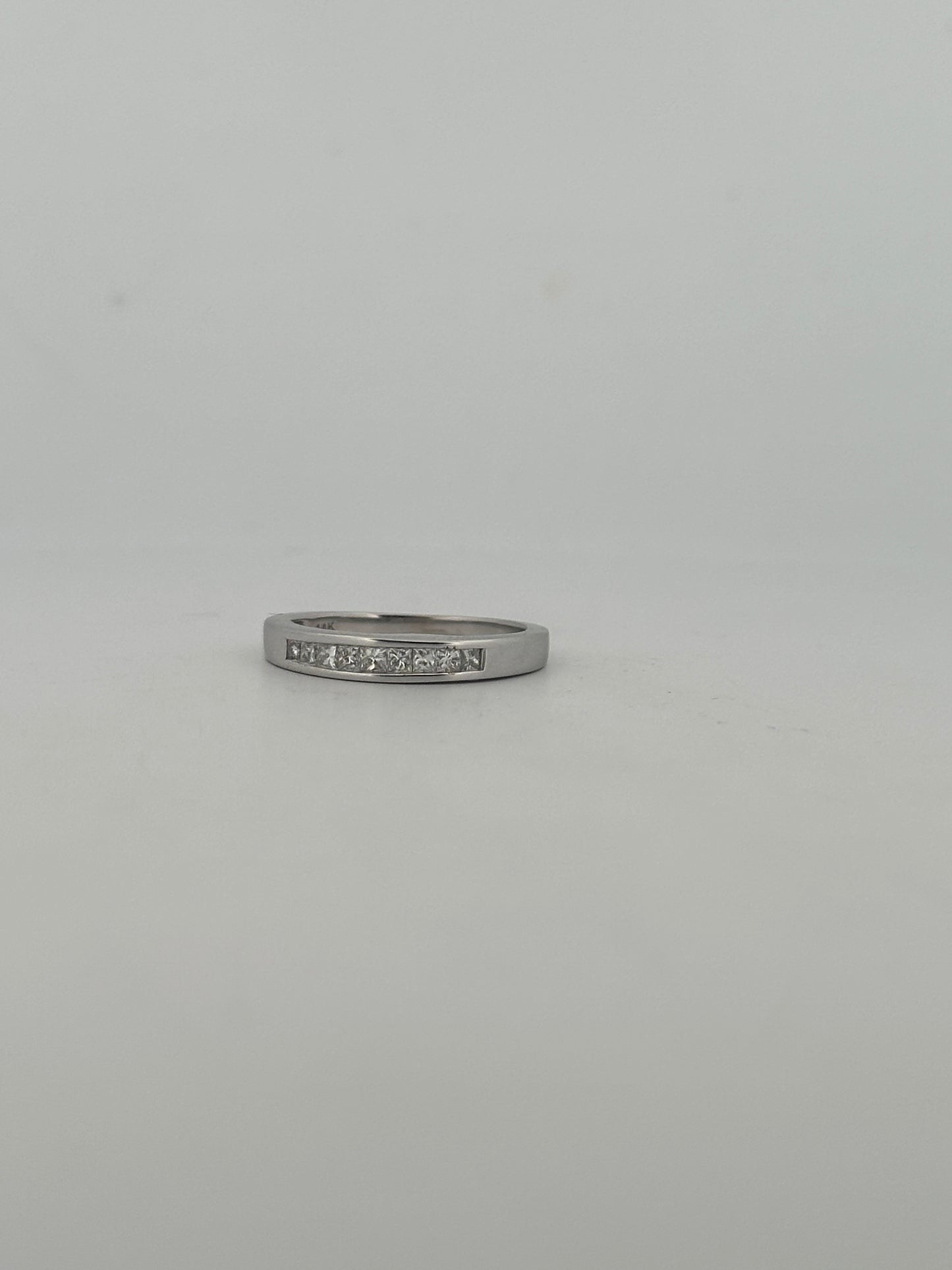 Natural princess cut diamond half eternity band in 14k white gold