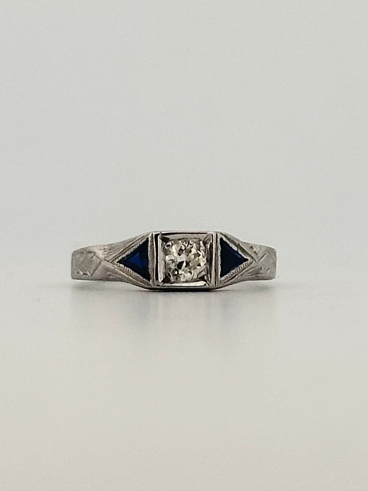 antique art deco diamond ring with sapphire accents in 14k white gold
