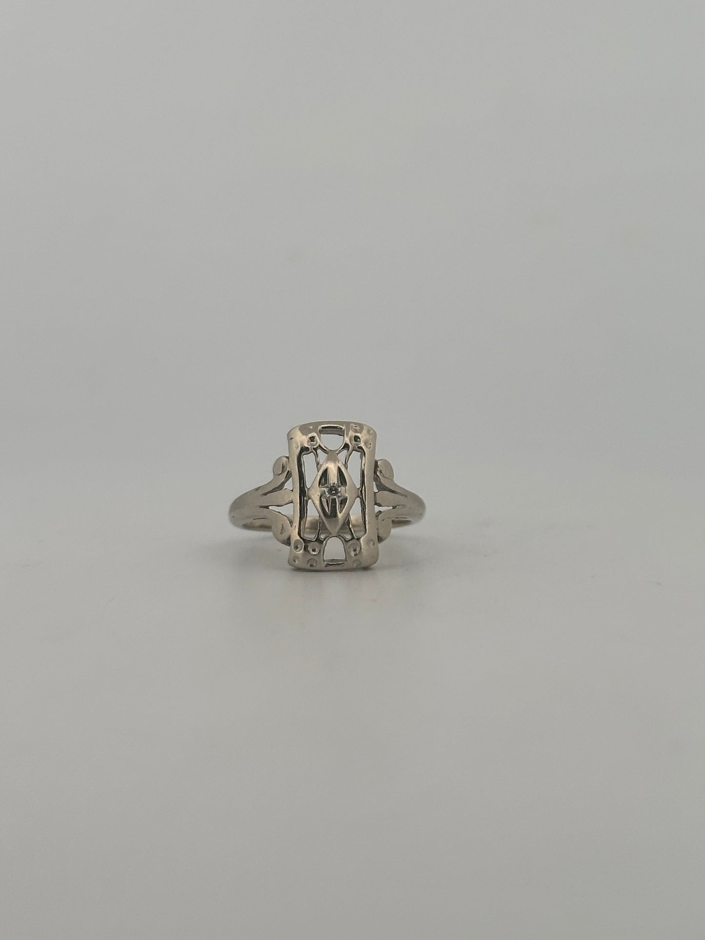 Antique art deco natural diamond shield ring in 10k white gold