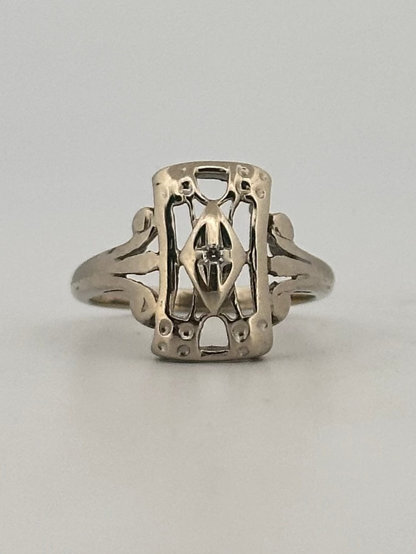 Antique art deco natural diamond shield ring in 10k white gold