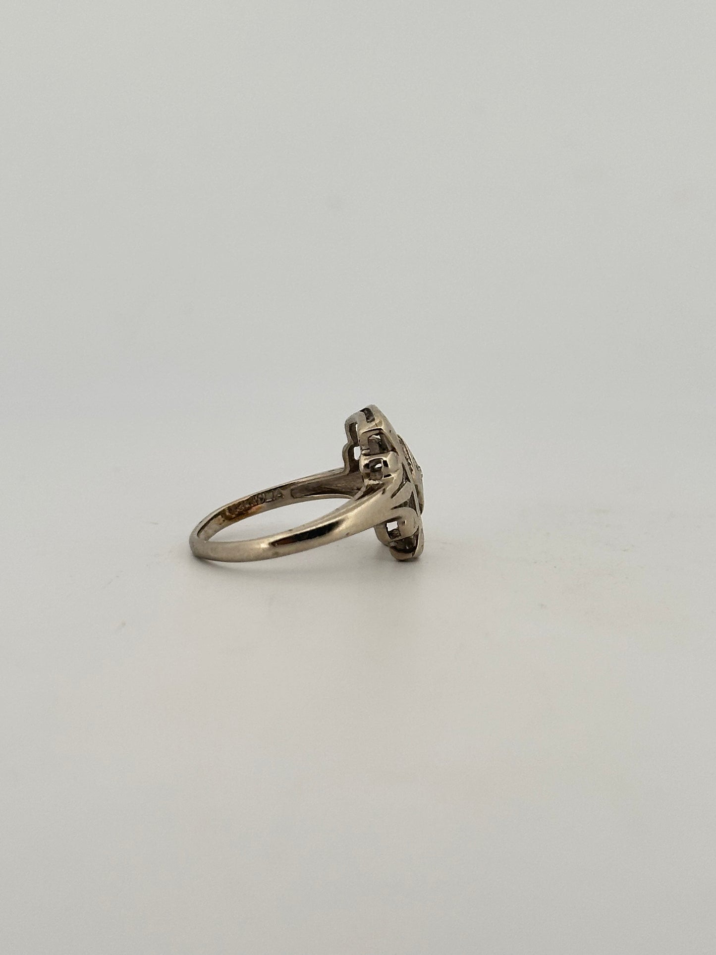 Antique art deco natural diamond shield ring in 10k white gold