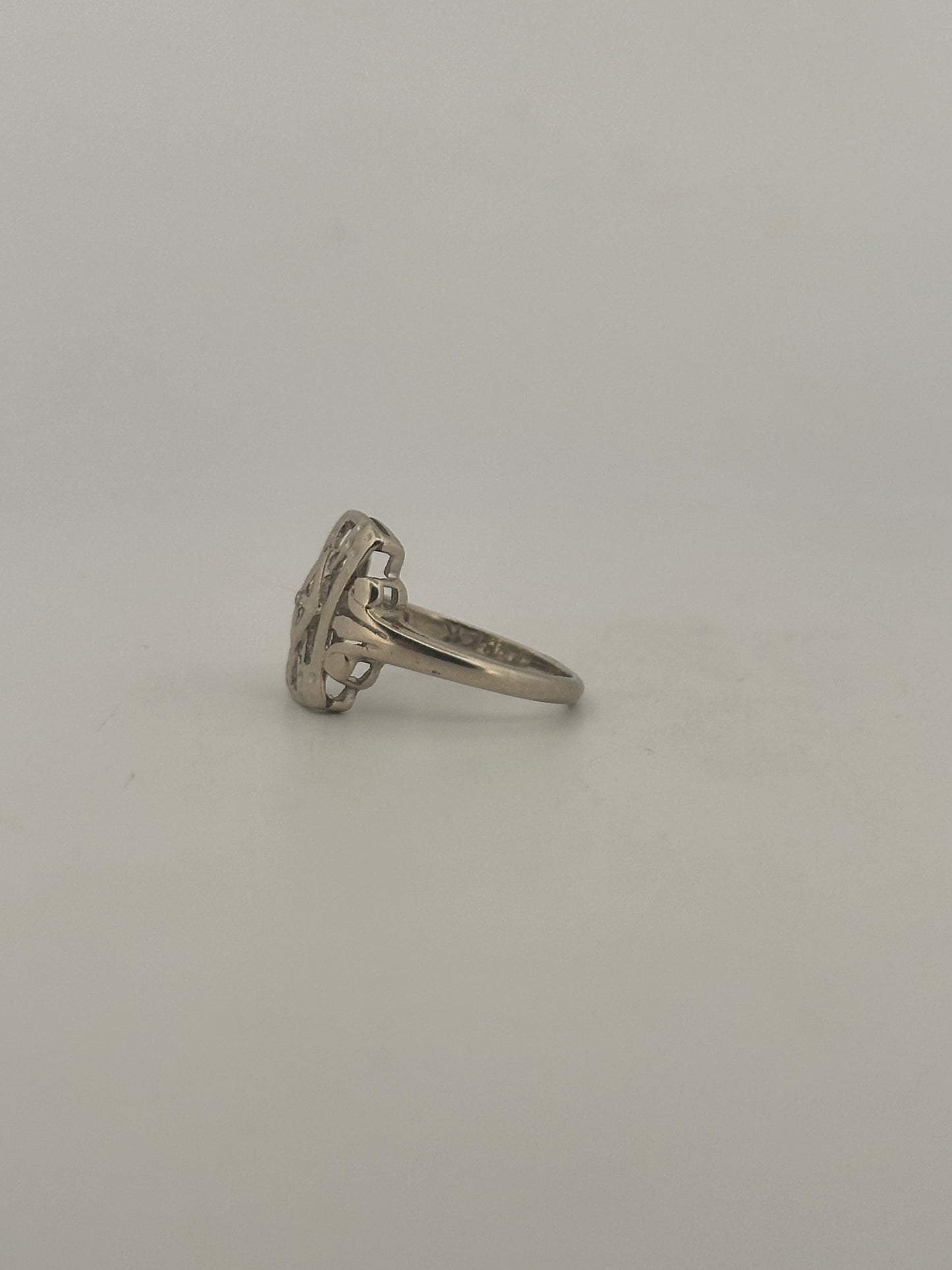 Antique art deco natural diamond shield ring in 10k white gold