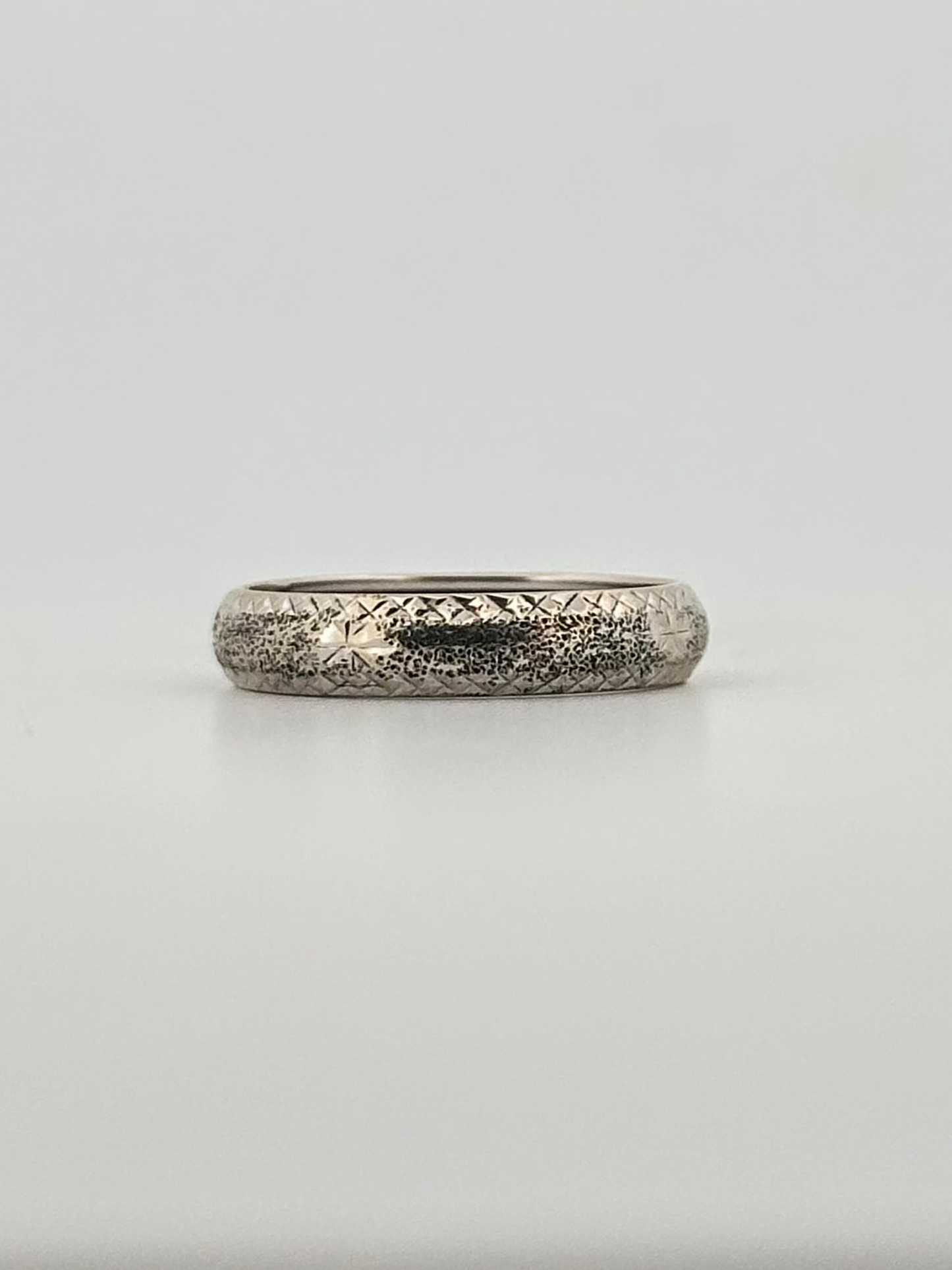 Vintage 14k white gold band with hand engraved detail.