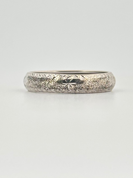 Vintage 14k white gold band with hand engraved detail.