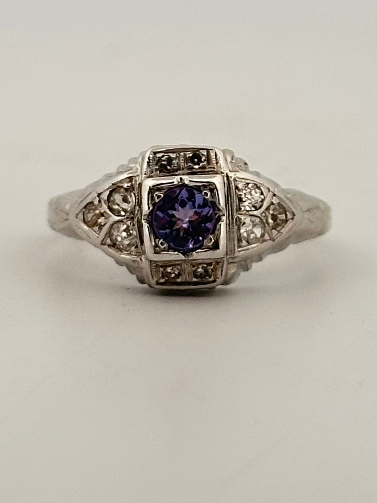 Antique art deco diamond and tanzanite ring in 18k white gold