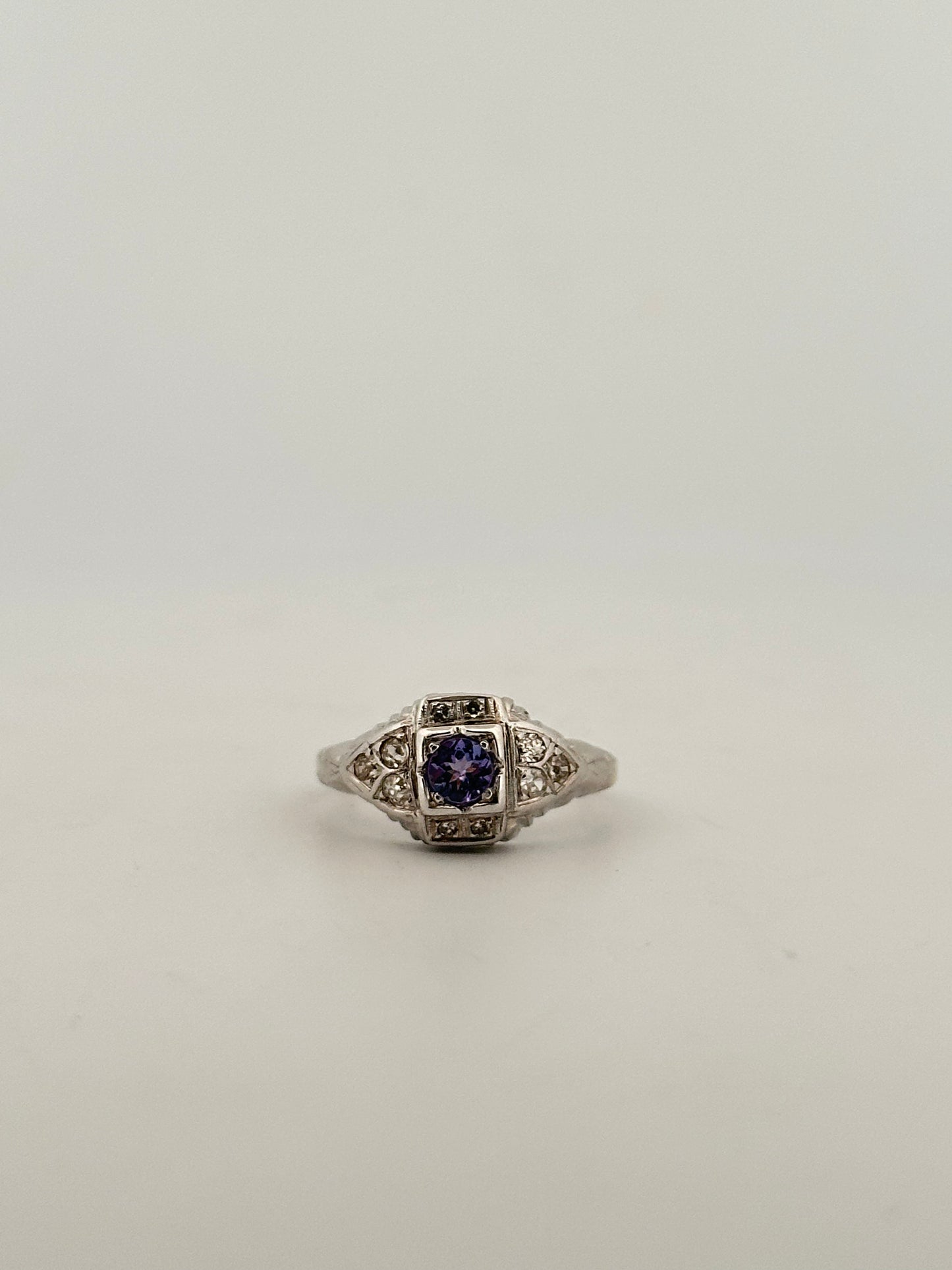 Antique art deco diamond and tanzanite ring in 18k white gold