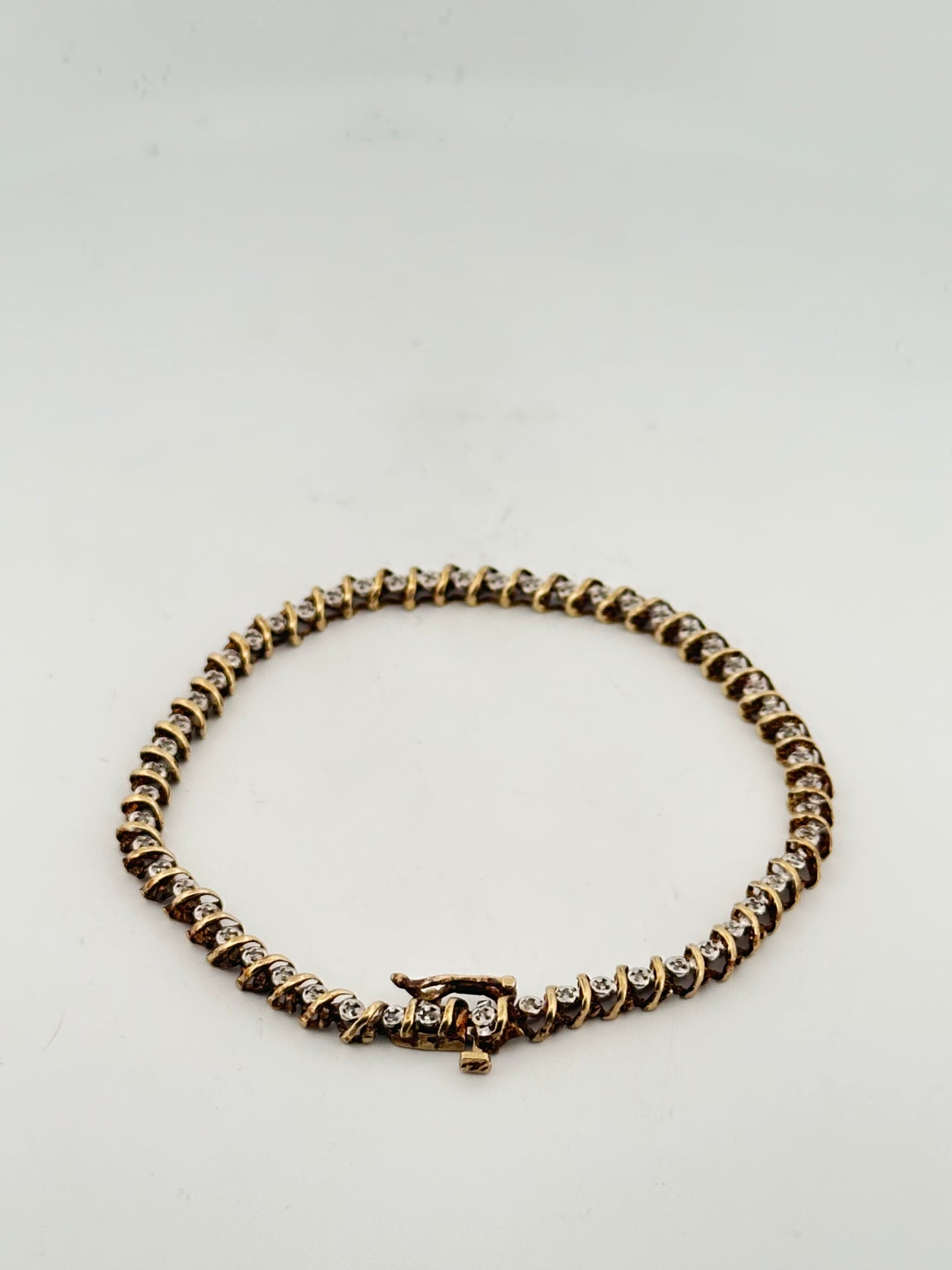 Vintage natural 1ct diamond tennis bracelet in 10k gold