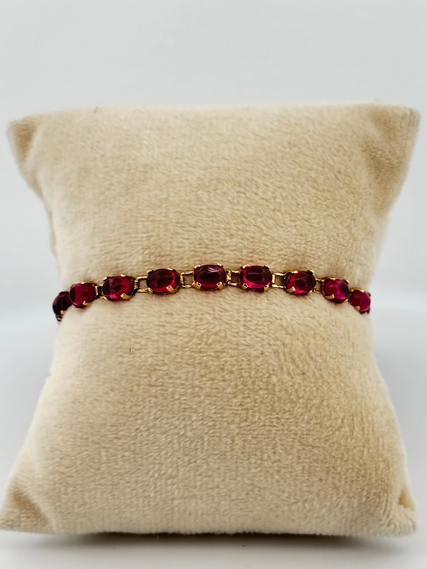 Vintage rhodalite garnet cabochon tennis bracelet in 14k yellow gold